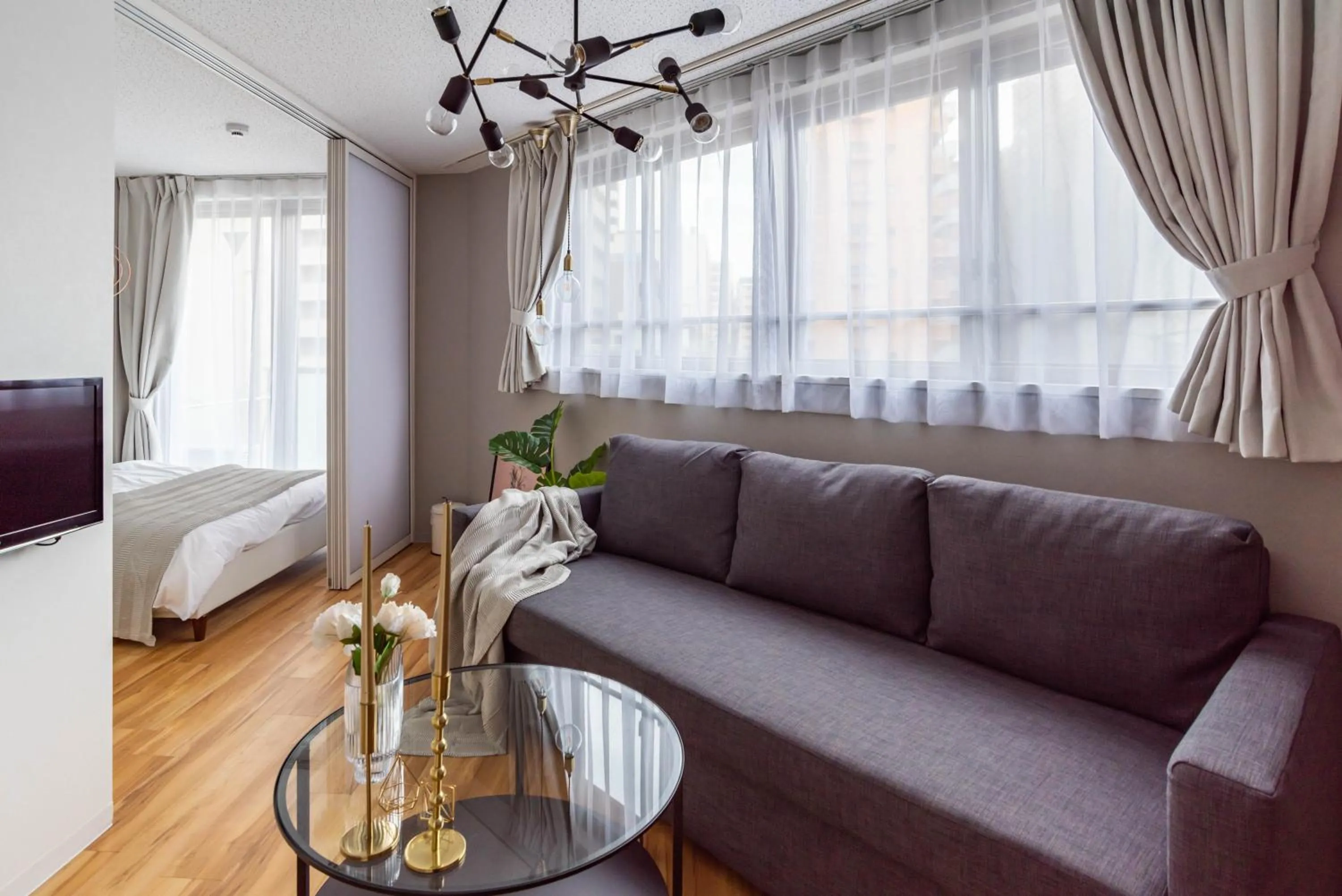 Living room, Bed in Exia Daikoku AFP Apartment