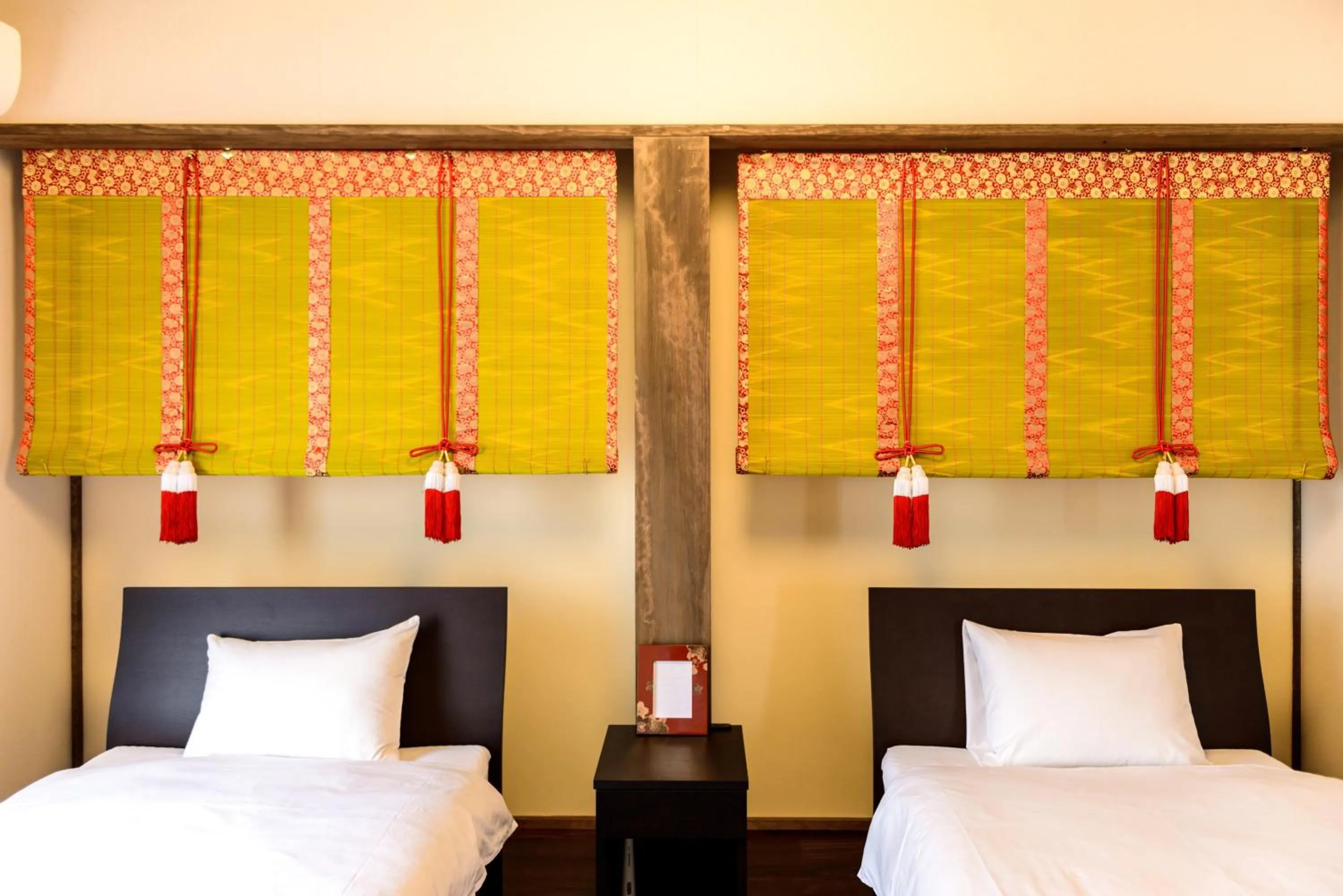 Bed in 京と家 おたびしょ庵 -Kyotoya Otabishoan-