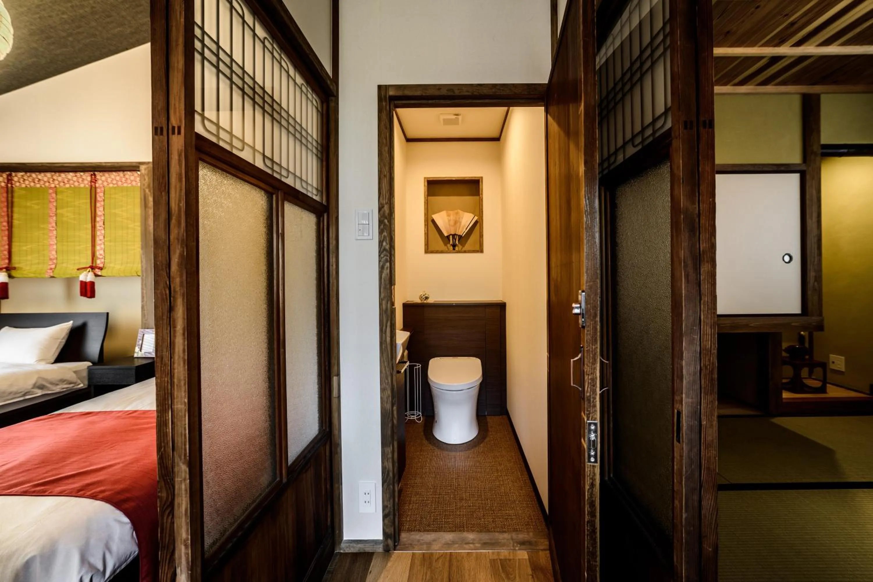 Bed in 京と家 おたびしょ庵 -Kyotoya Otabishoan-