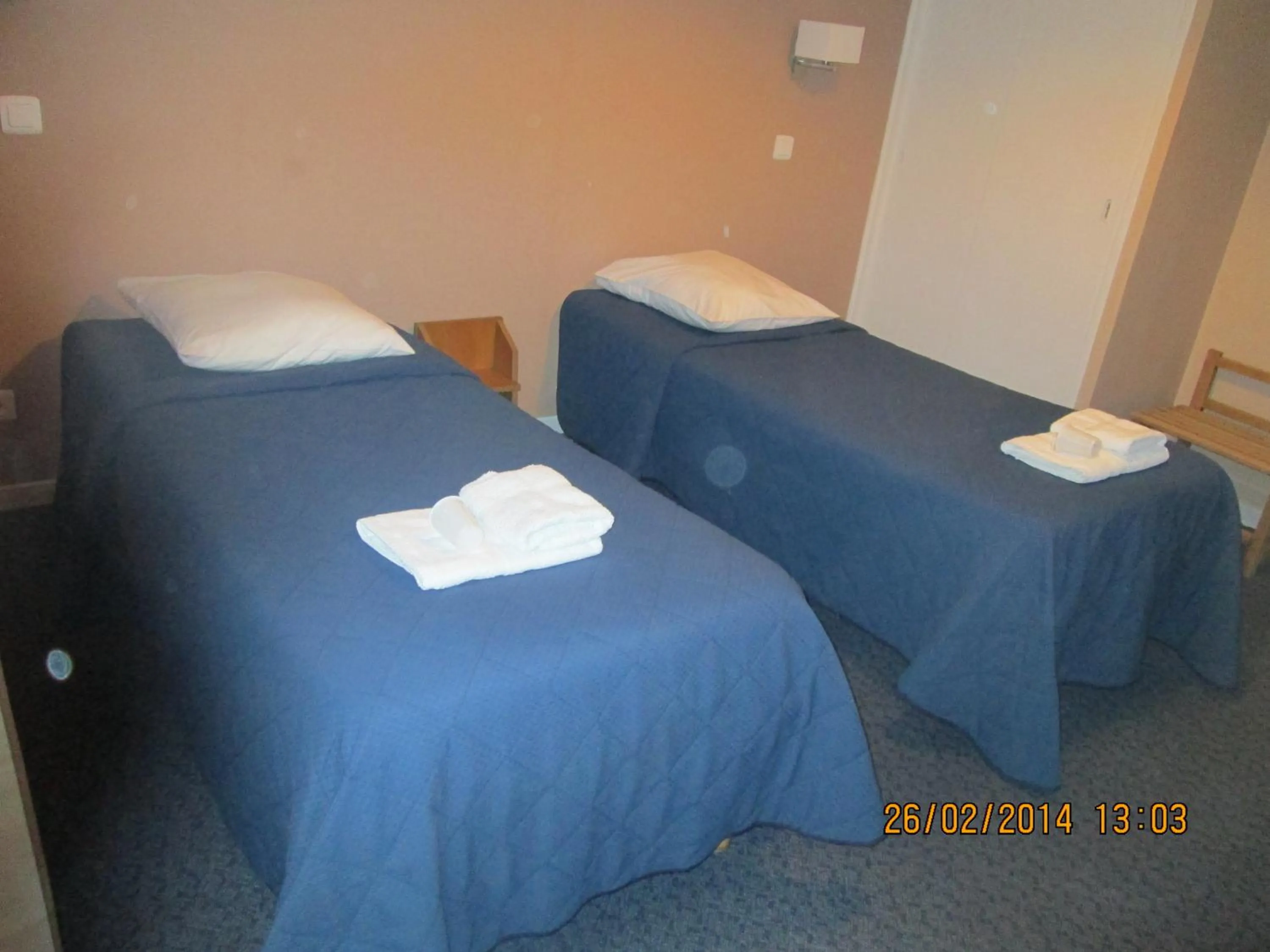 Bed in Hôtel-Restaurant Le Blueberry