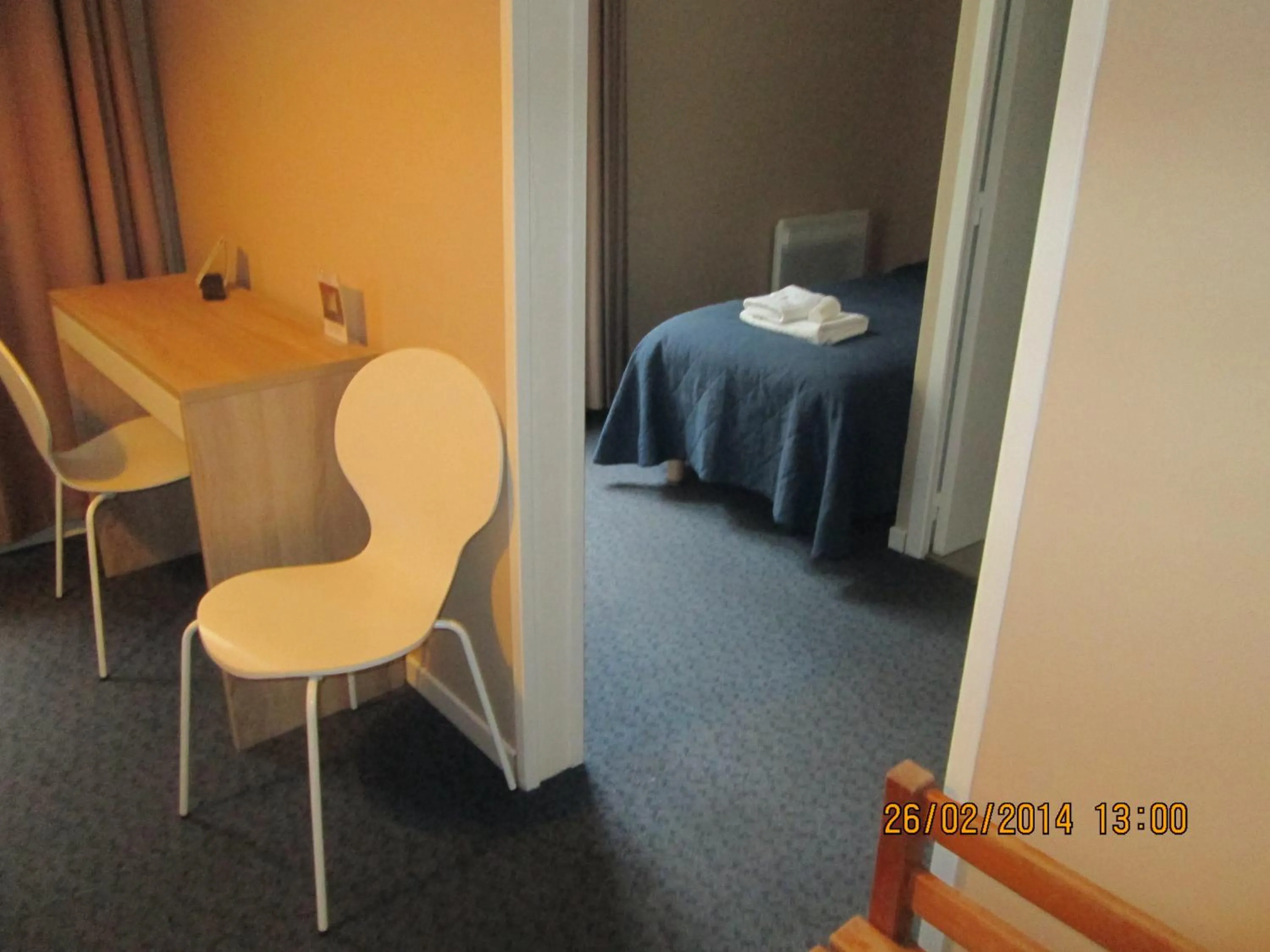 Bedroom in Hôtel-Restaurant Le Blueberry