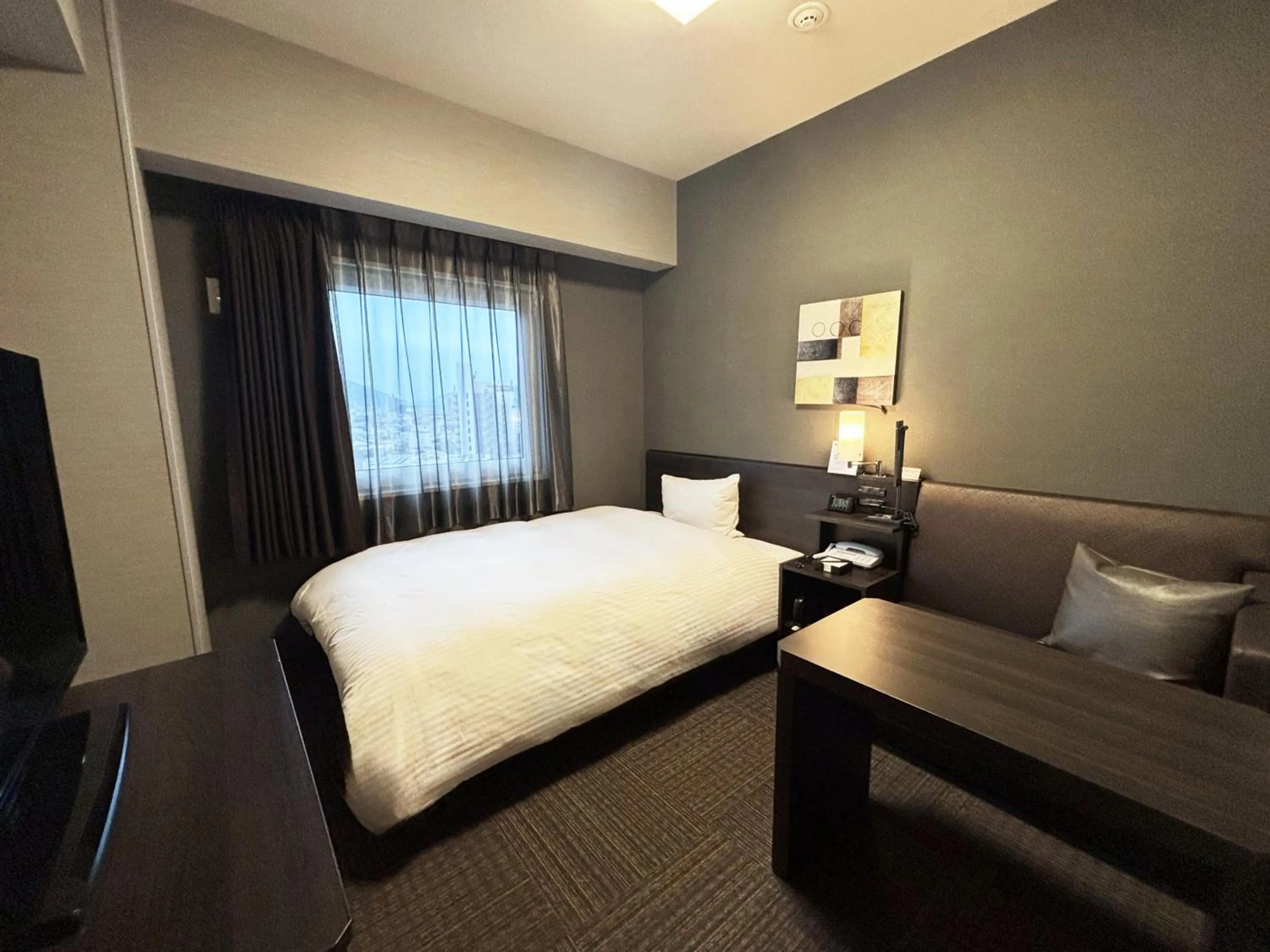 Photo of the whole room, Bed in Hotel Route-inn Yamaguchi Yuda Onsen