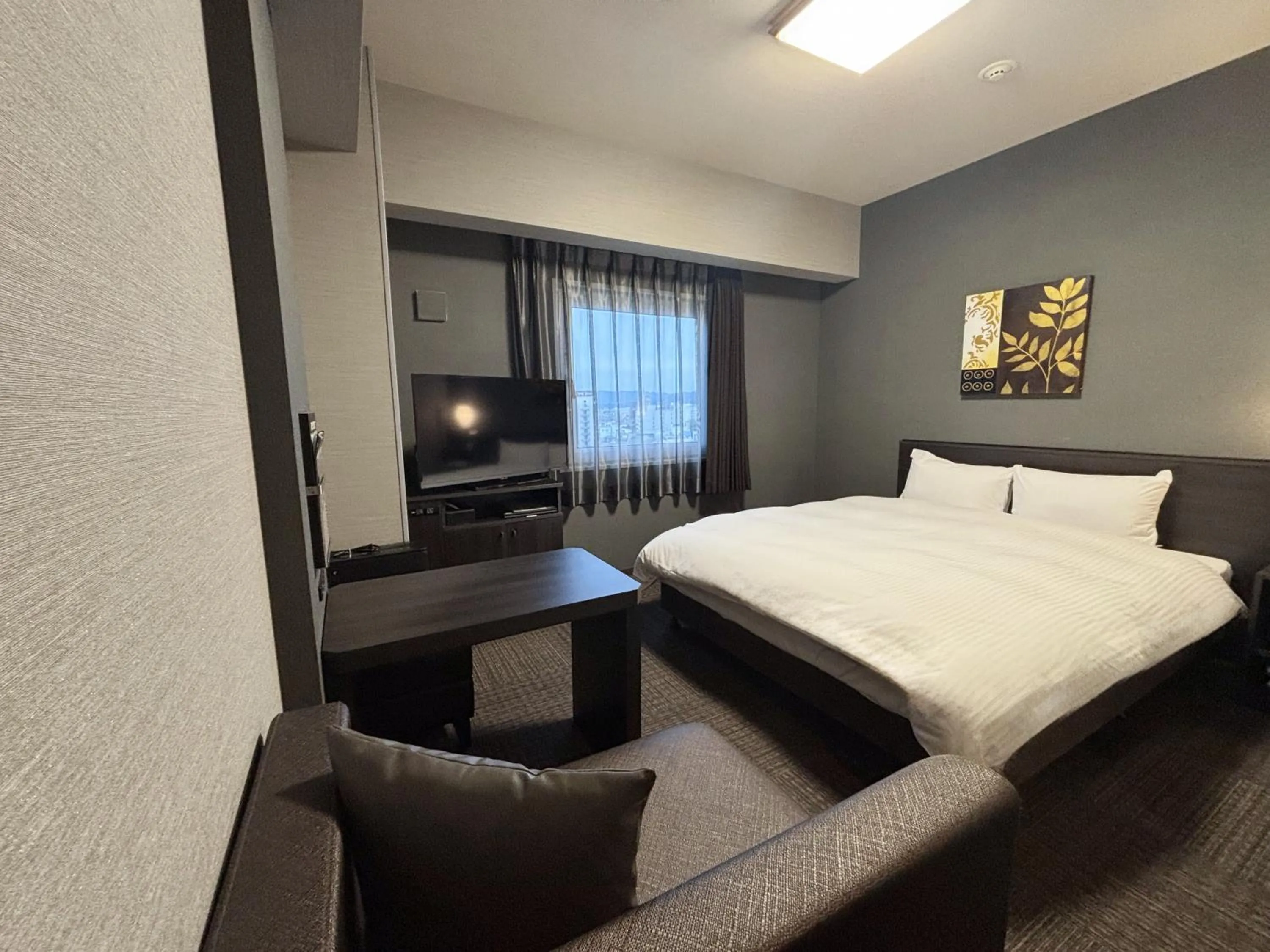 Photo of the whole room, Bed in Hotel Route-inn Yamaguchi Yuda Onsen