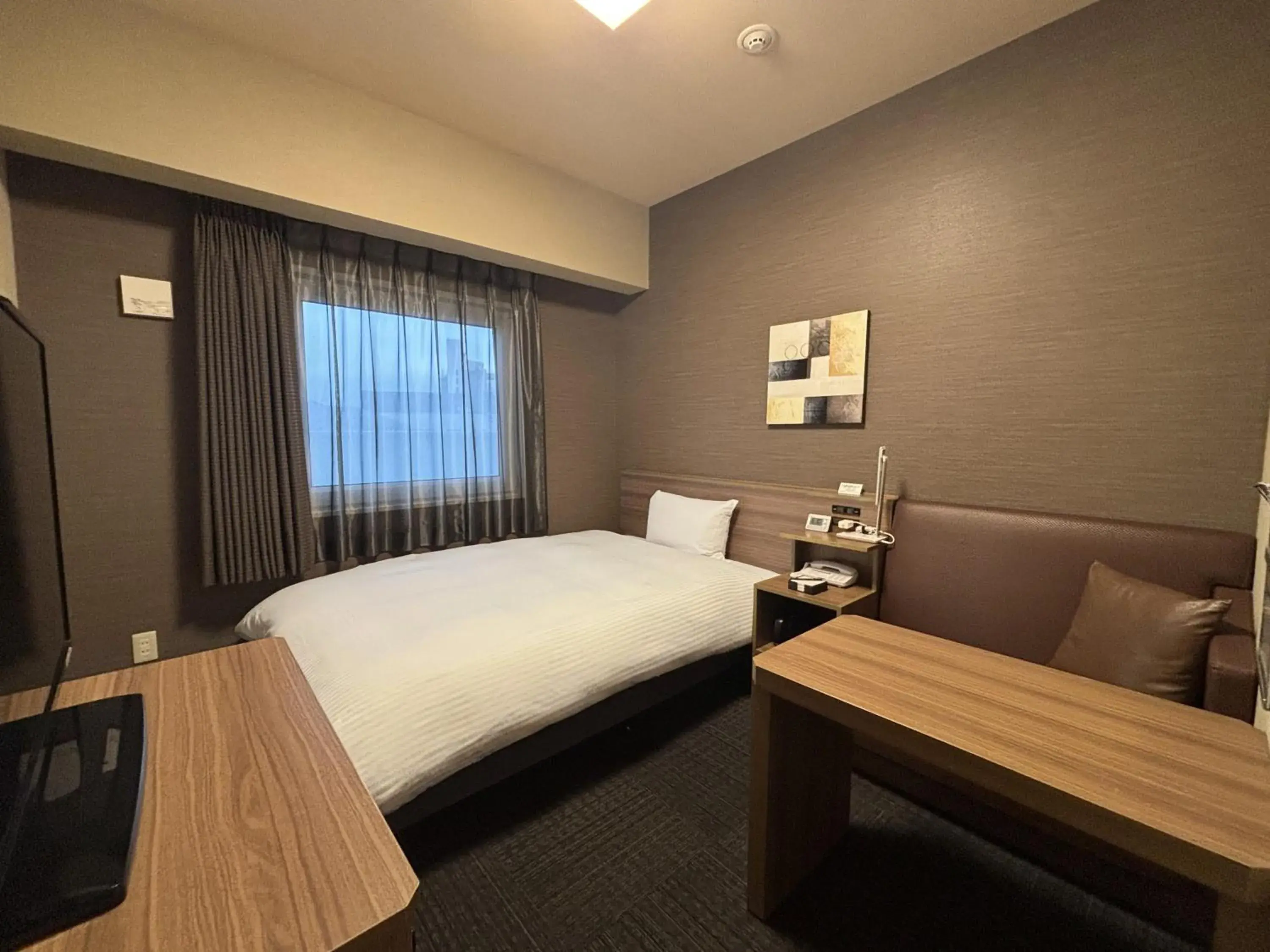 Photo of the whole room, Bed in Hotel Route-inn Yamaguchi Yuda Onsen Photo of the whole room, Bed in Hotel Route-inn Yamaguchi Yuda Onsen