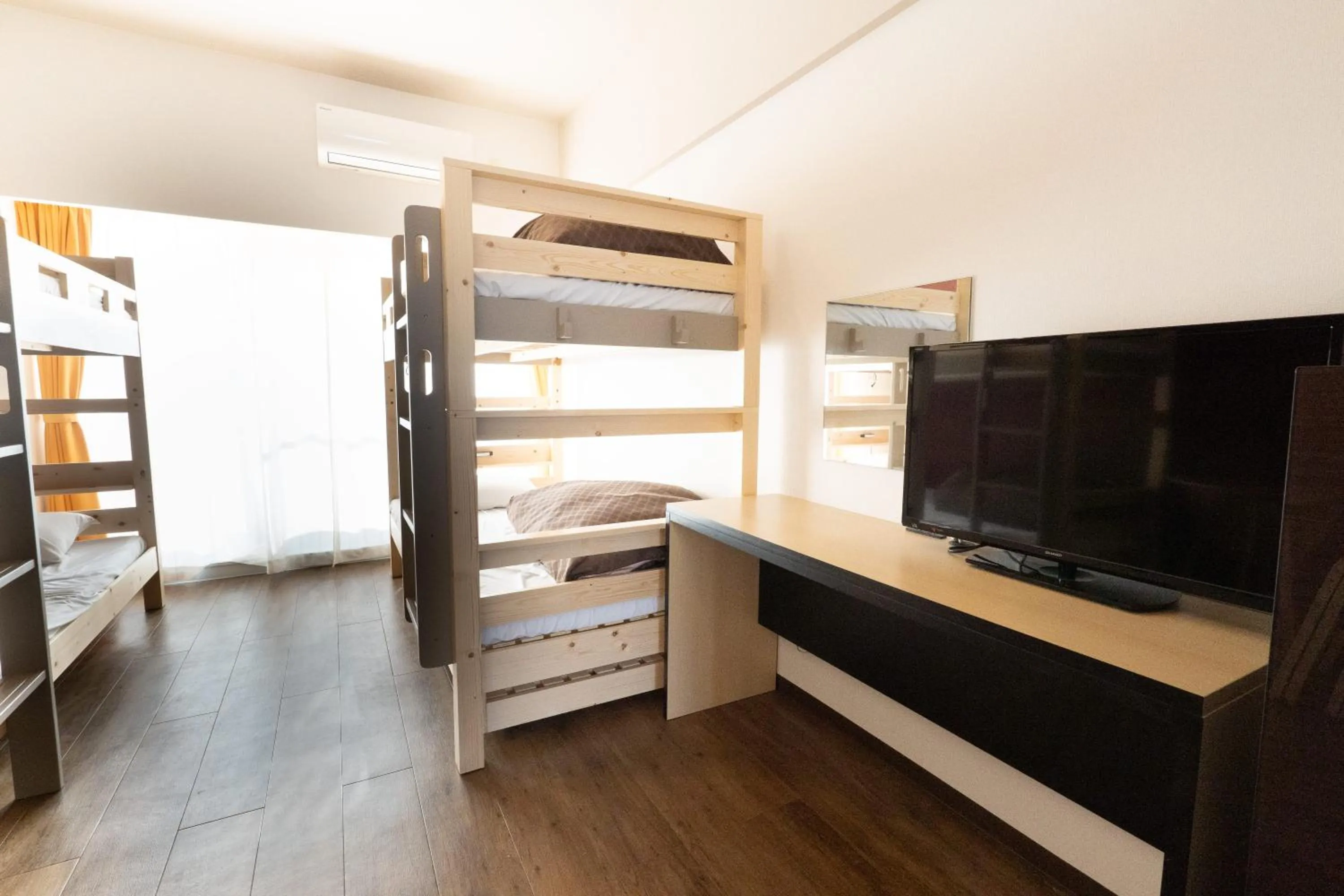 Bed in ミチ旅ホテル 読谷