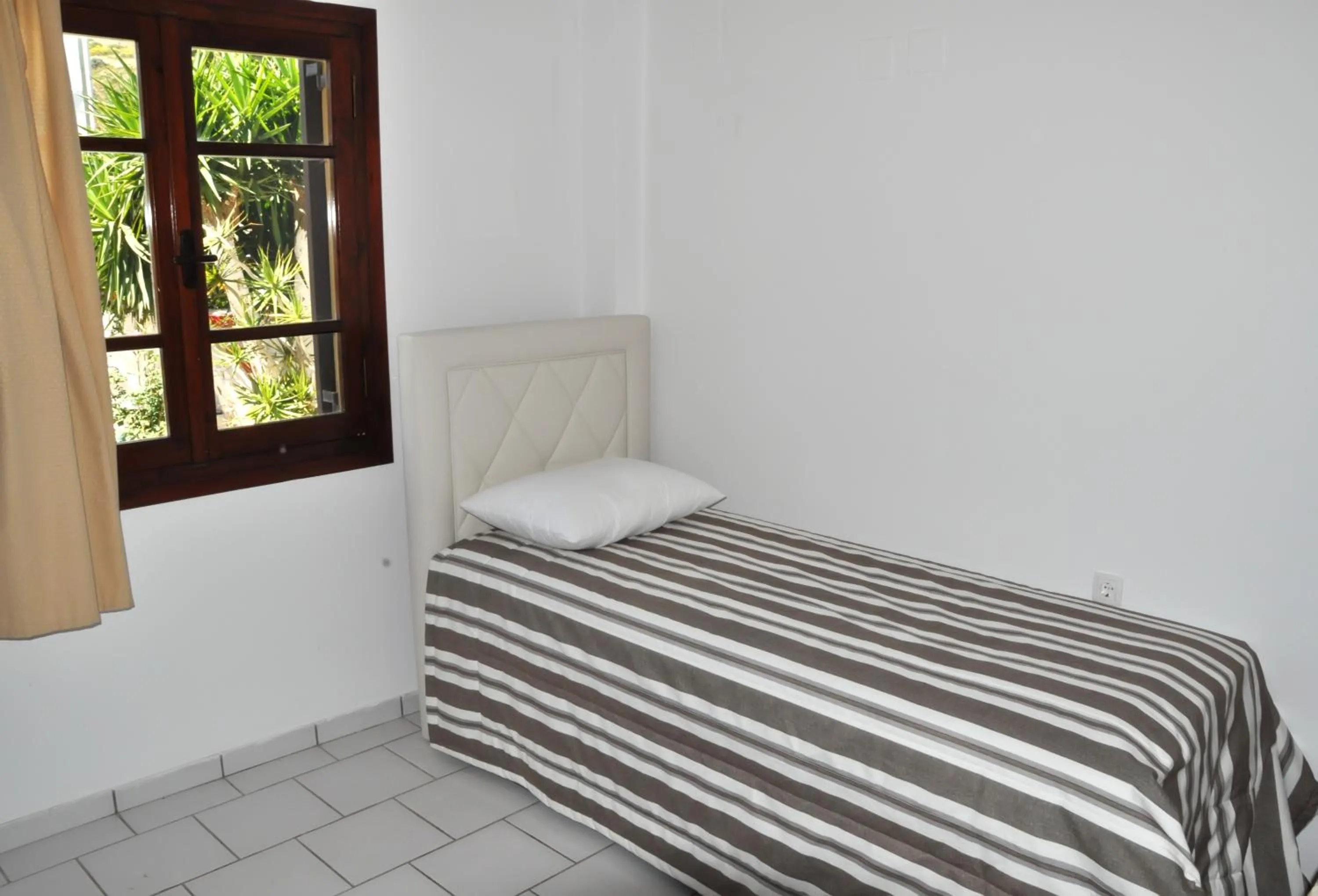 Bed in Pennystella Apartments