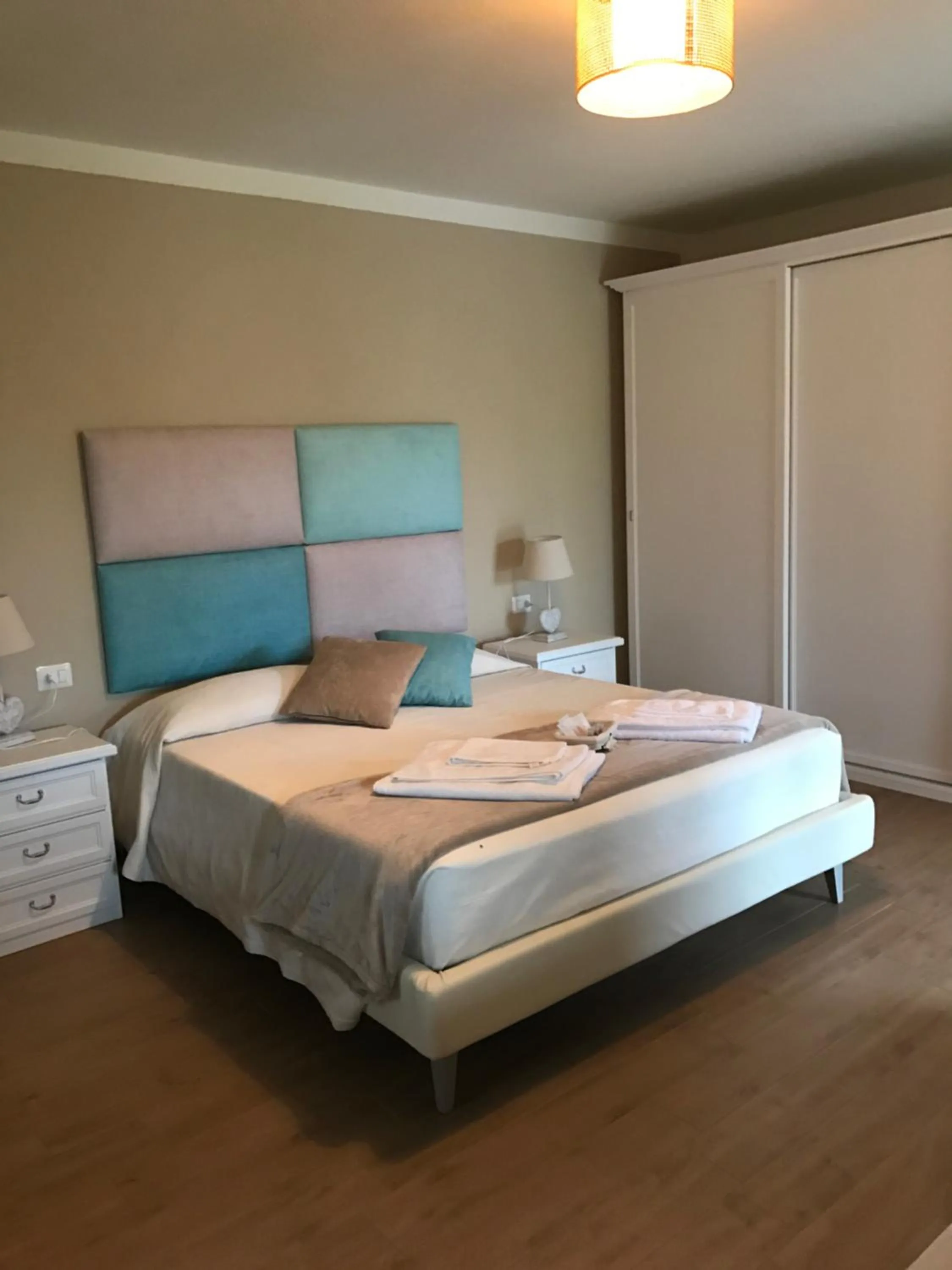 Photo of the whole room in Il Giardino di Daniela Apartments