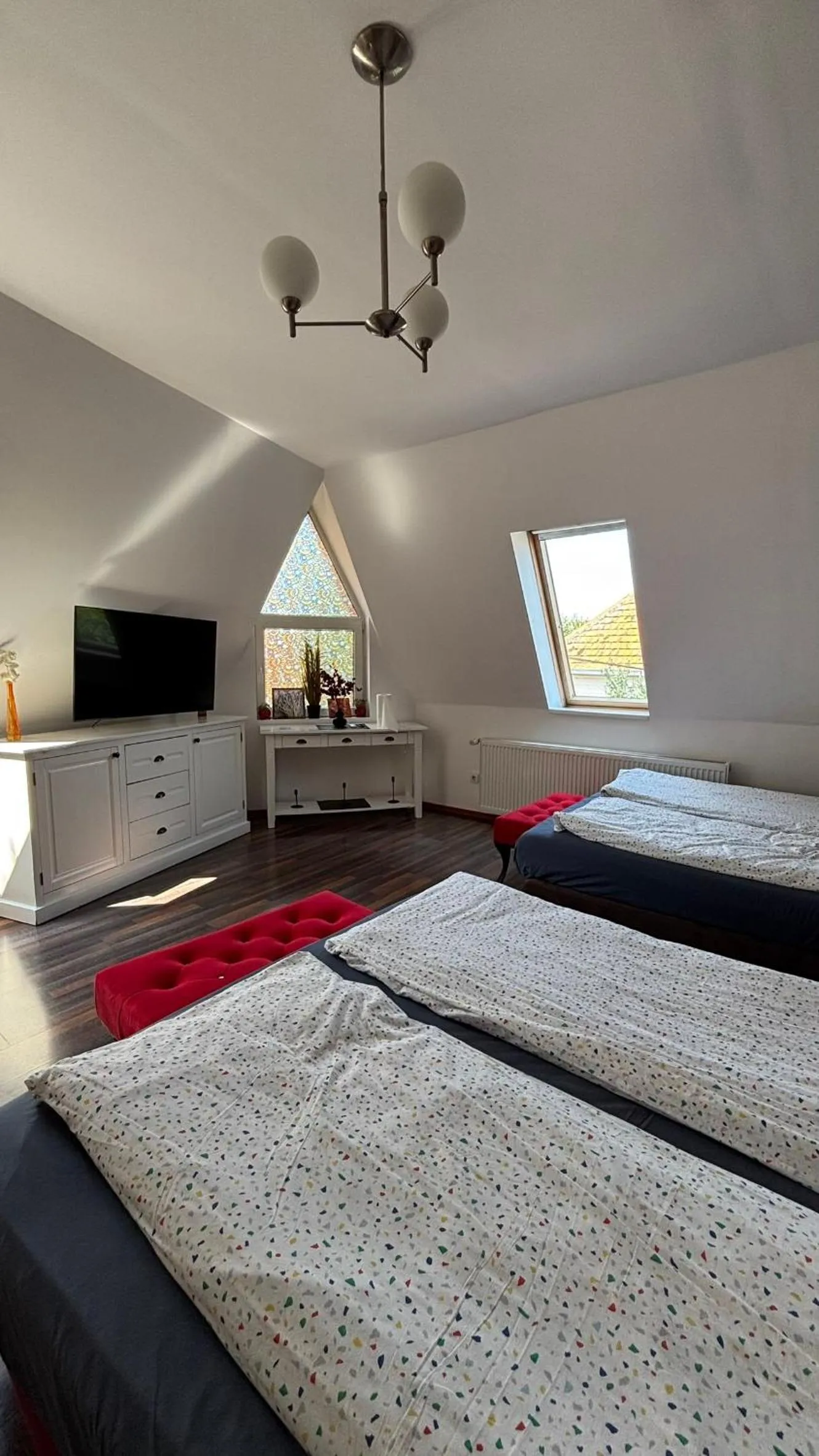 Bed in Pannónia Rooms and Apartments