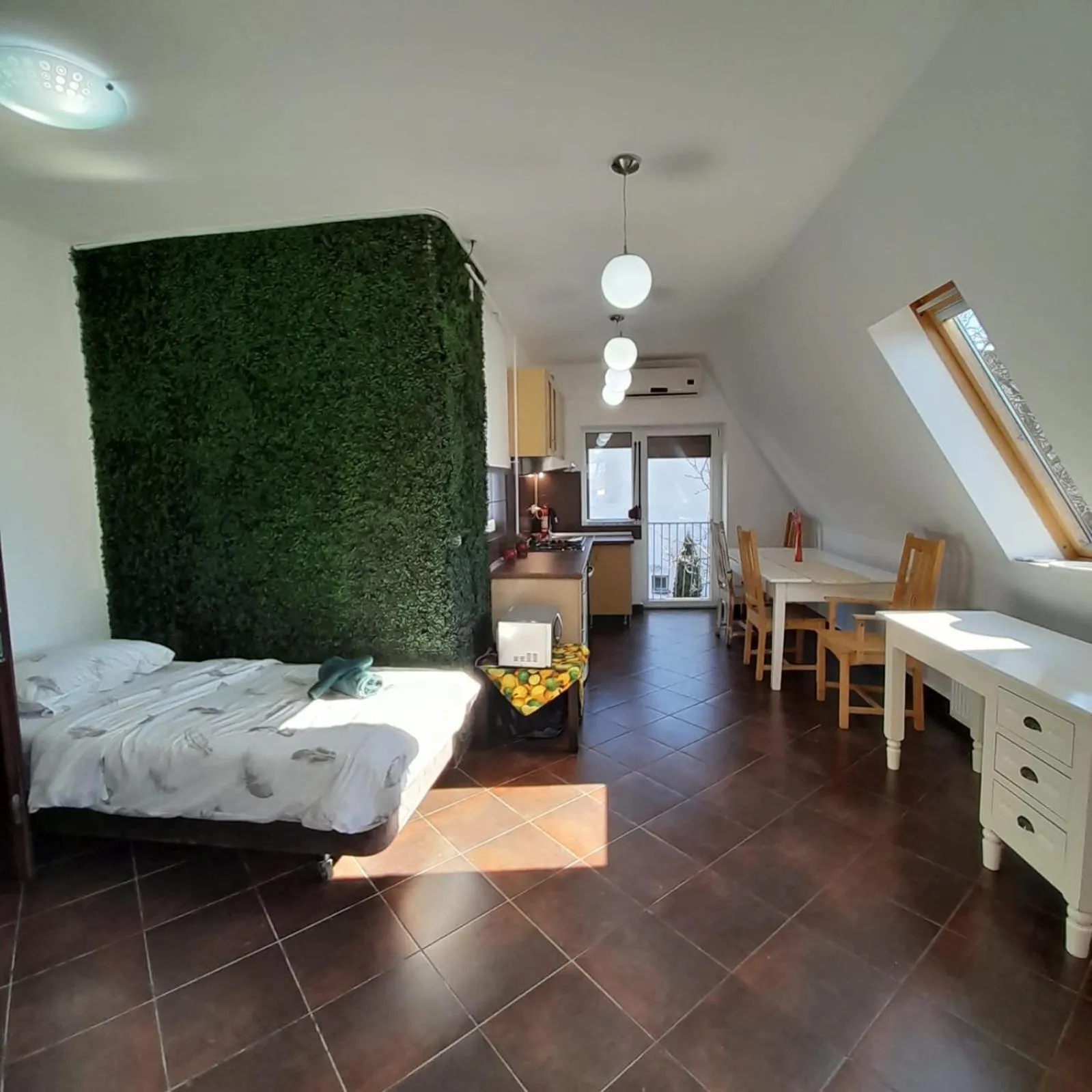 Bed in Pannónia Rooms and Apartments