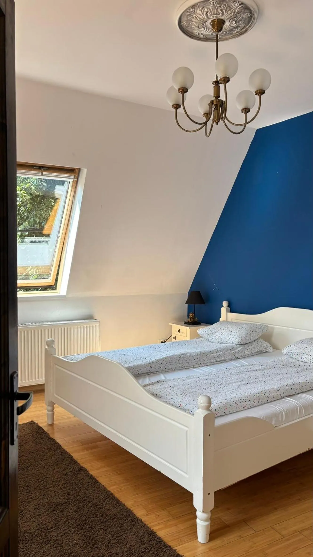 Bed in Pannónia Rooms and Apartments