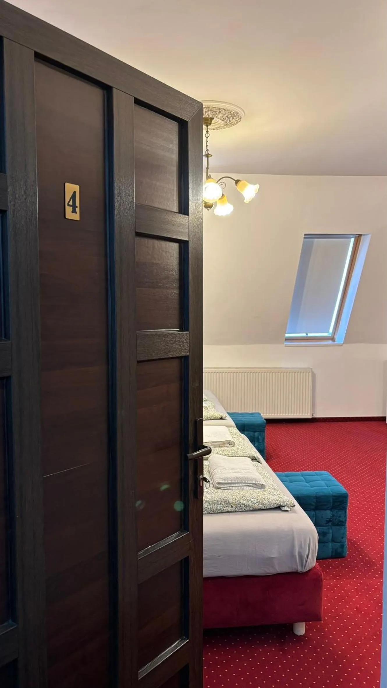 Bed in Pannónia Rooms and Apartments