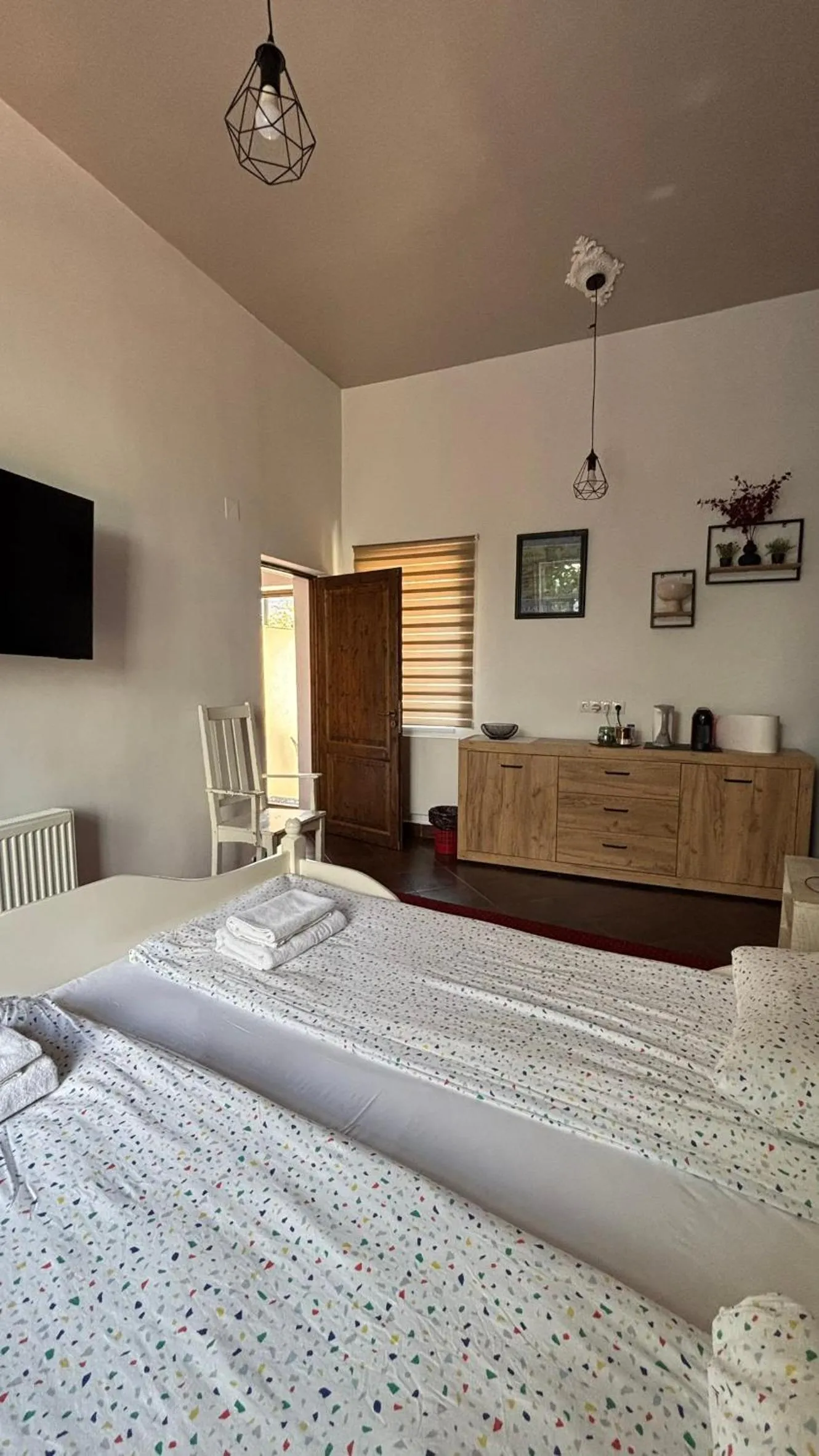 Bed in Pannónia Rooms and Apartments