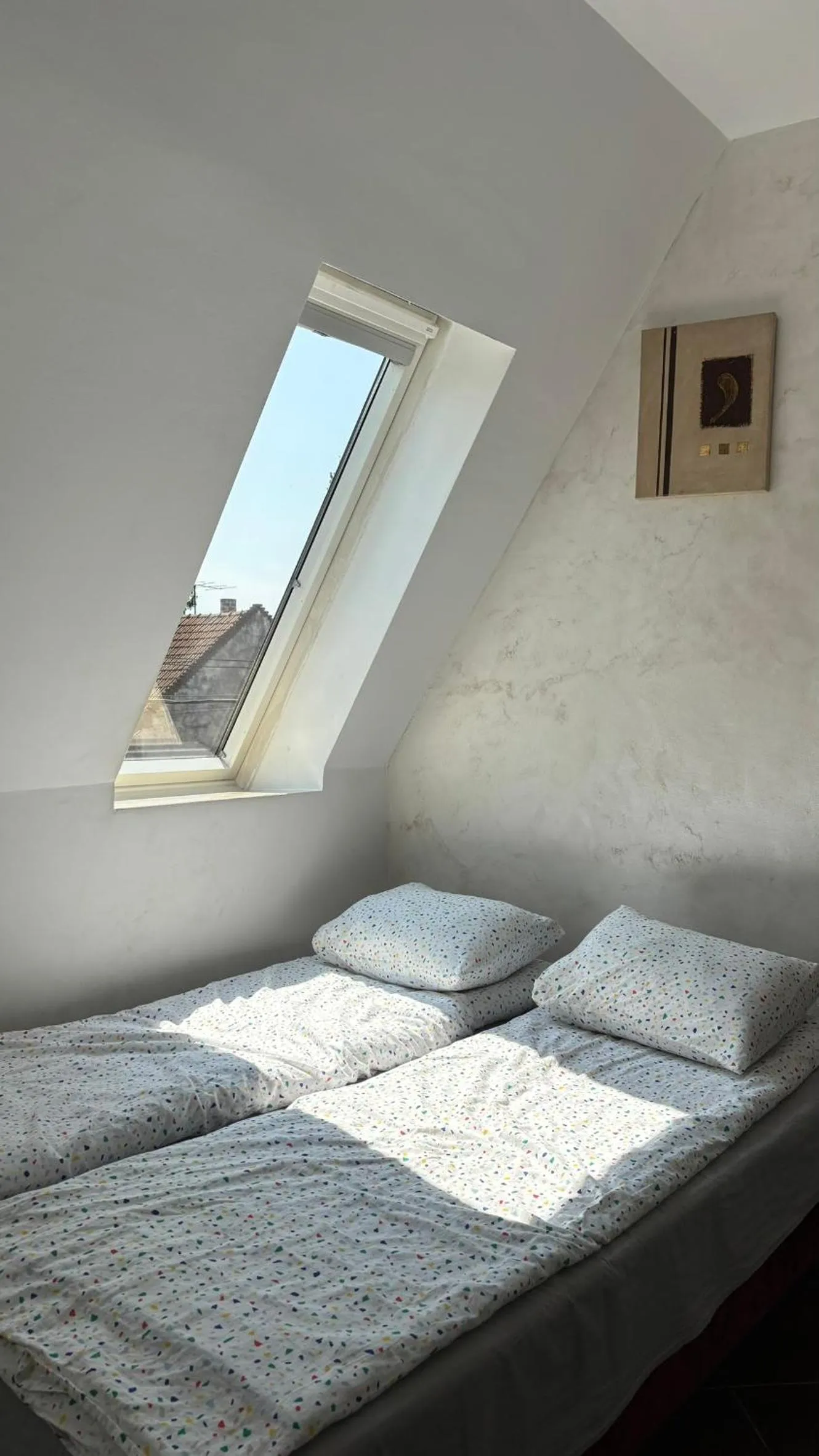 Bed in Pannónia Rooms and Apartments