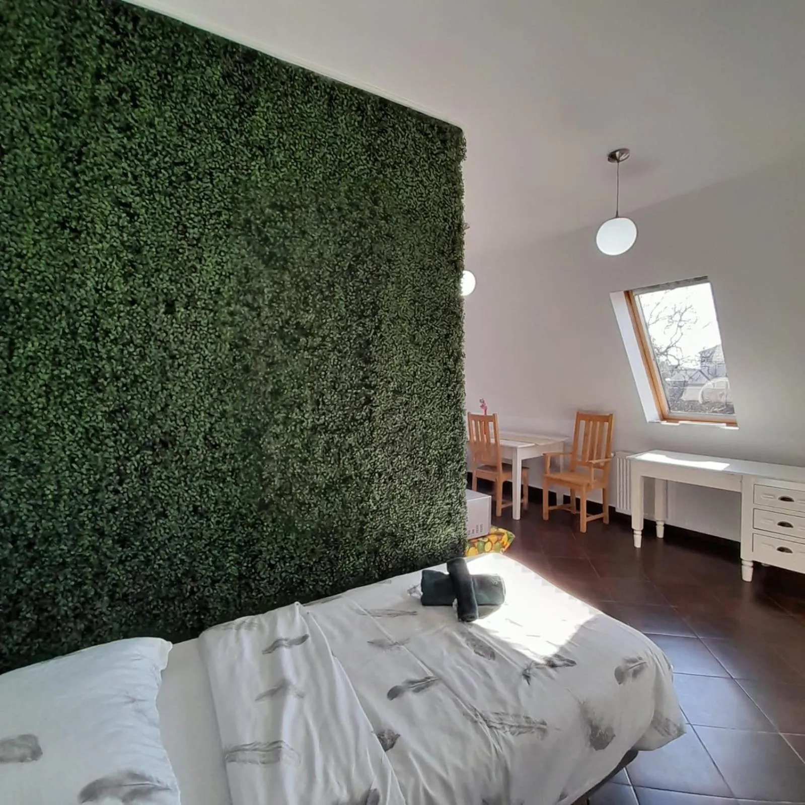 Bed in Pannónia Rooms and Apartments