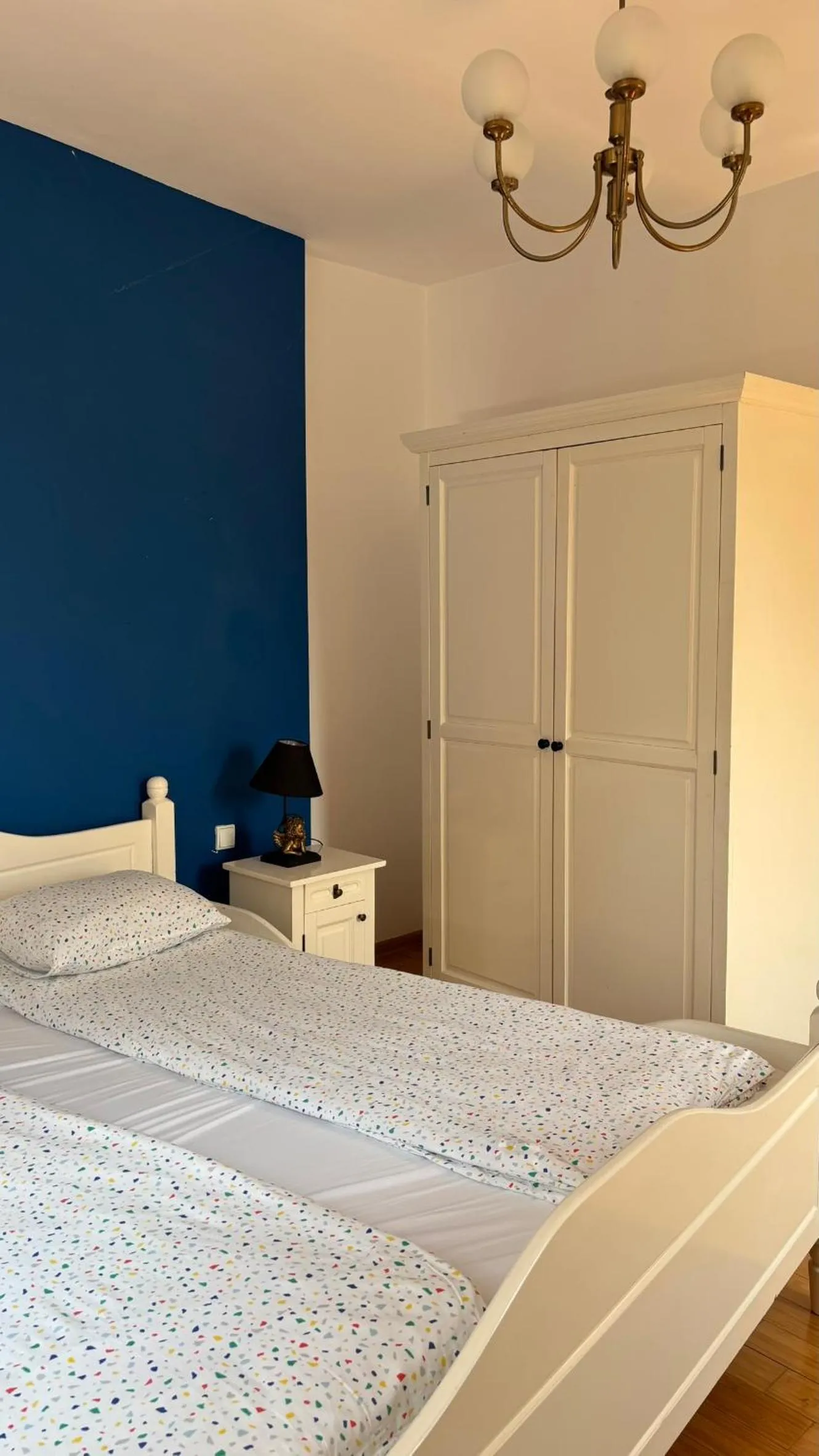 Bed in Pannónia Rooms and Apartments