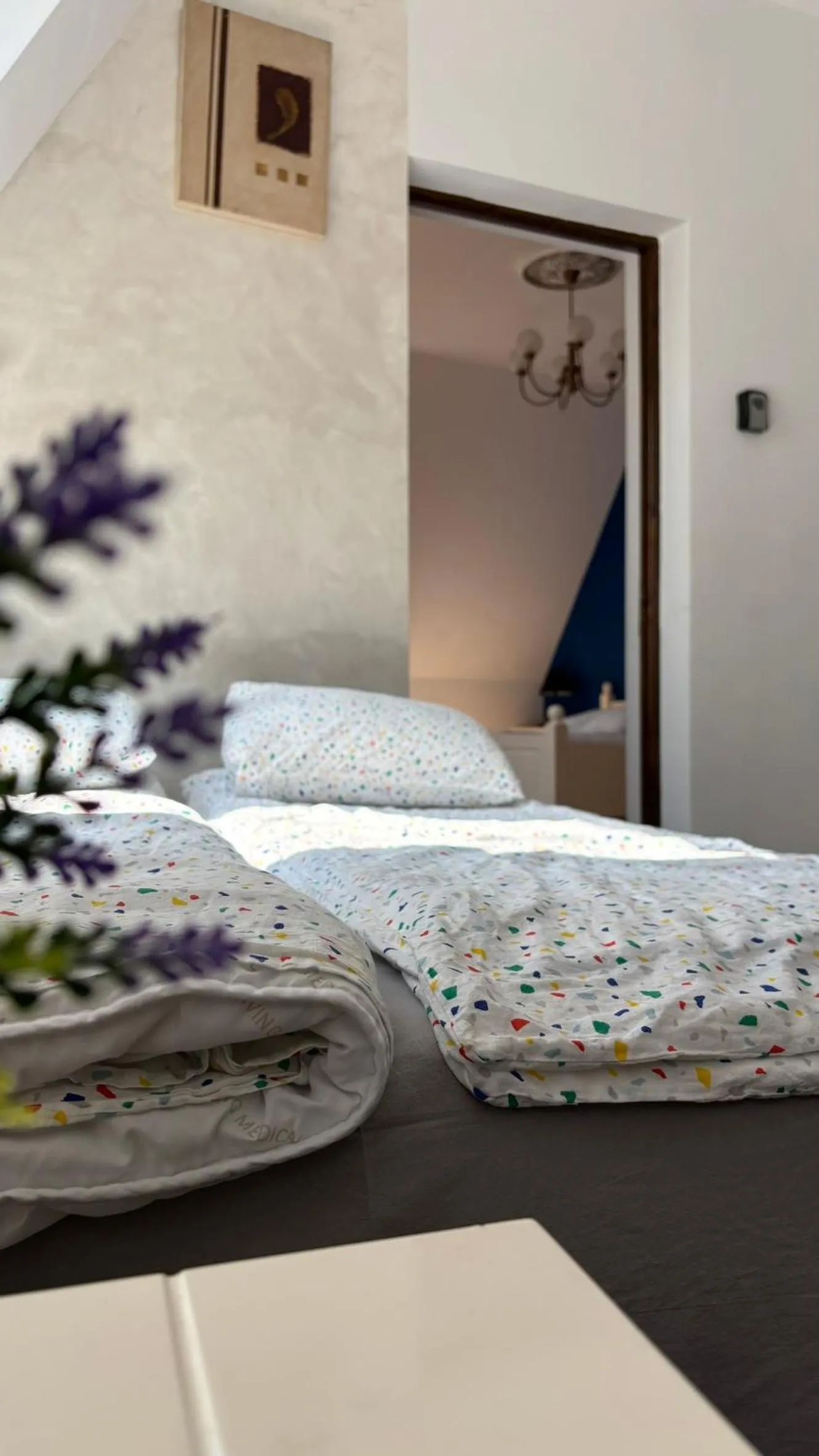 Bed in Pannónia Rooms and Apartments