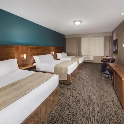 Bed in Heritage Inn Hotel & Convention Centre - Pincher Creek