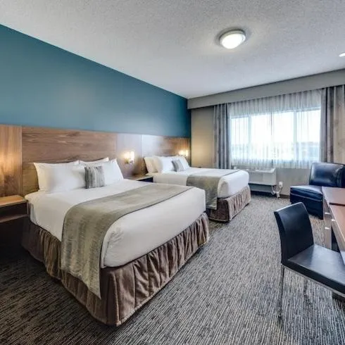 Bed in Heritage Inn Hotel & Convention Centre - Pincher Creek