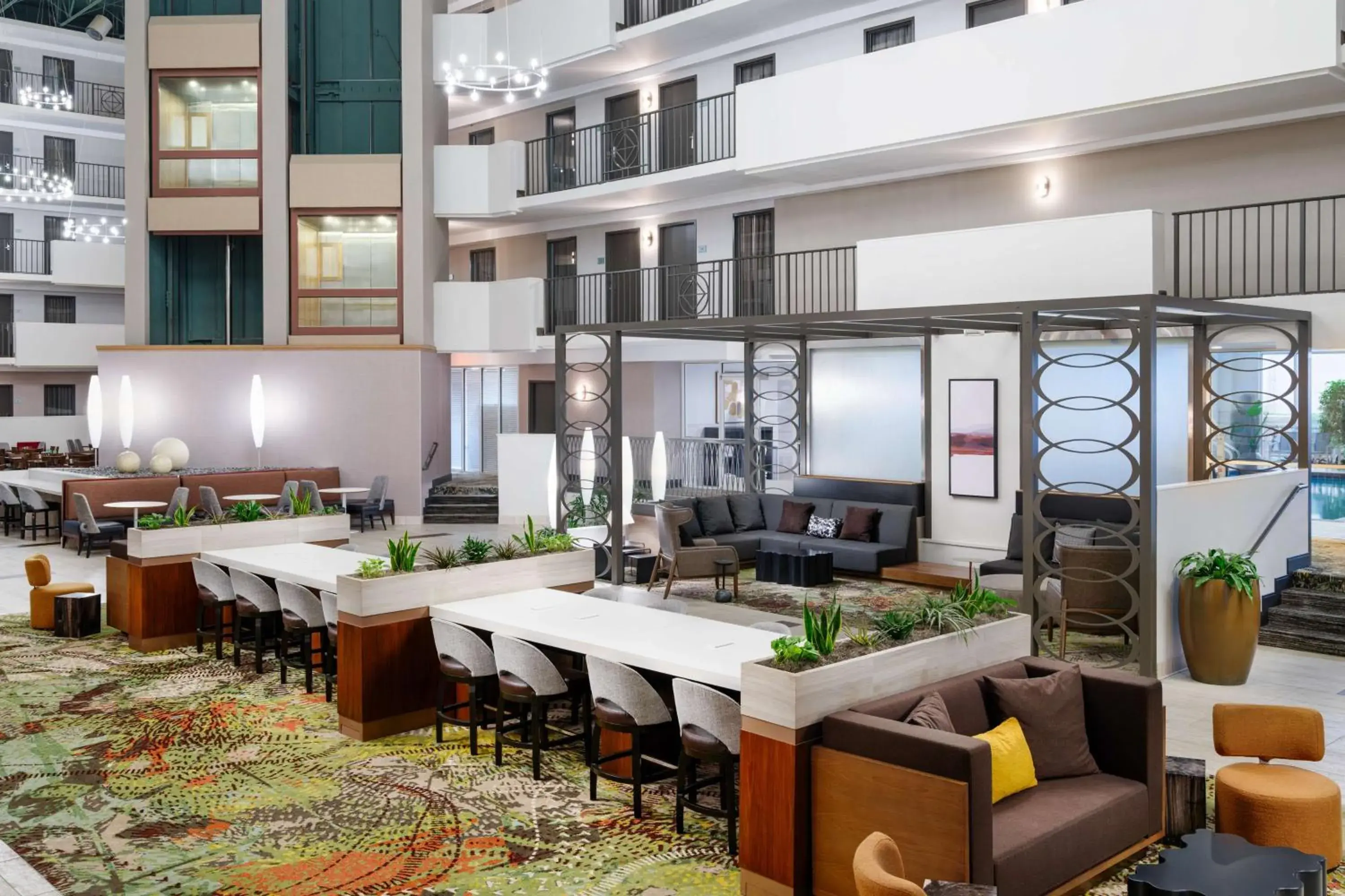 Lobby or reception in Embassy Suites by Hilton Memphis East Germantown Area Lobby or reception in Embassy Suites by Hilton Memphis East Germantown Area