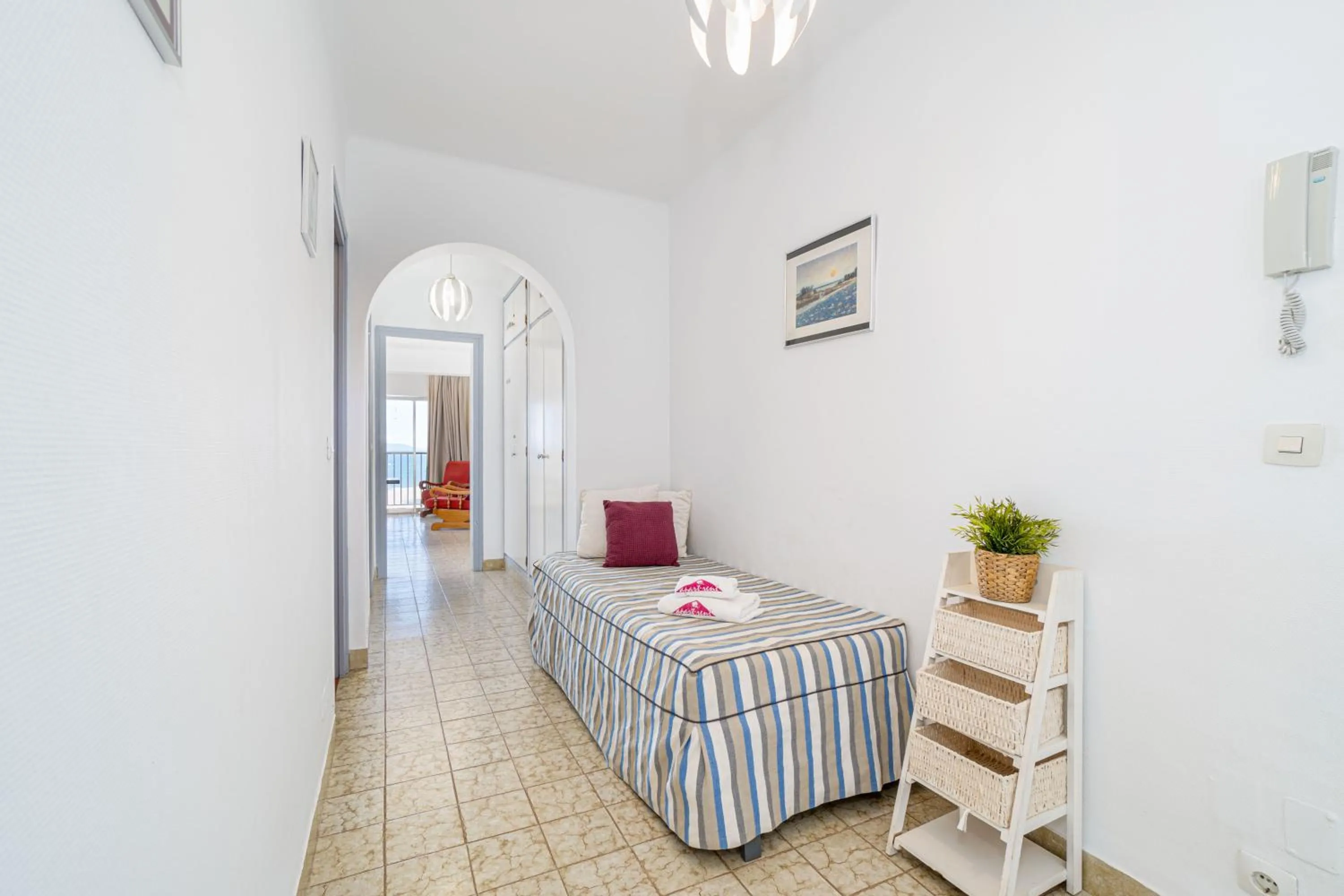 Decorative detail, Bed in Basic Comfort Apartment Canigo 0030