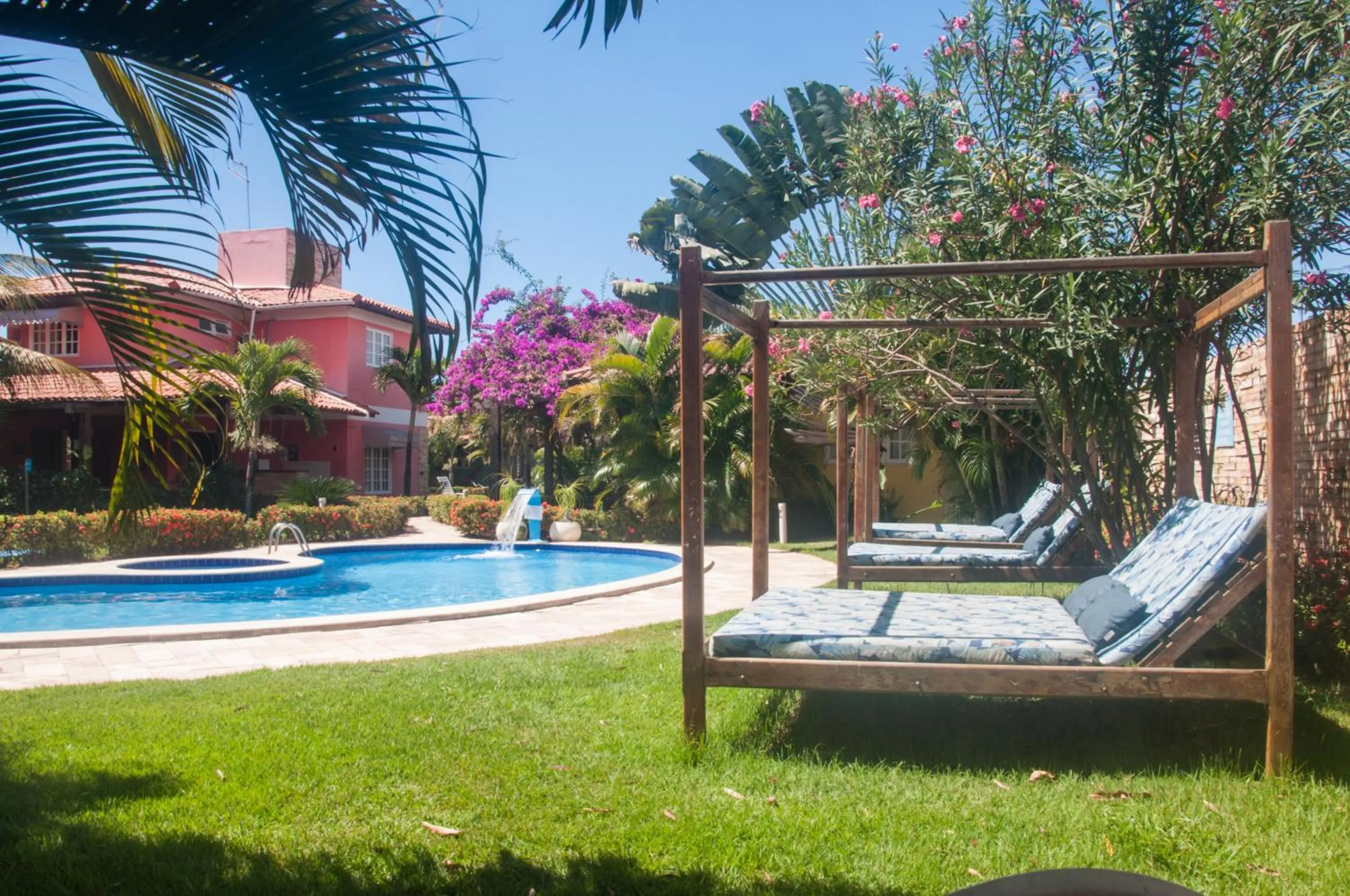 Swimming pool in La Dolce Vita Flat & Pousada