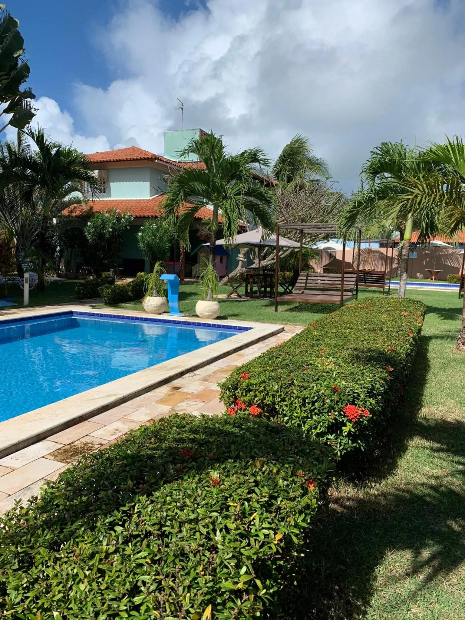 Swimming pool in La Dolce Vita Flat & Pousada