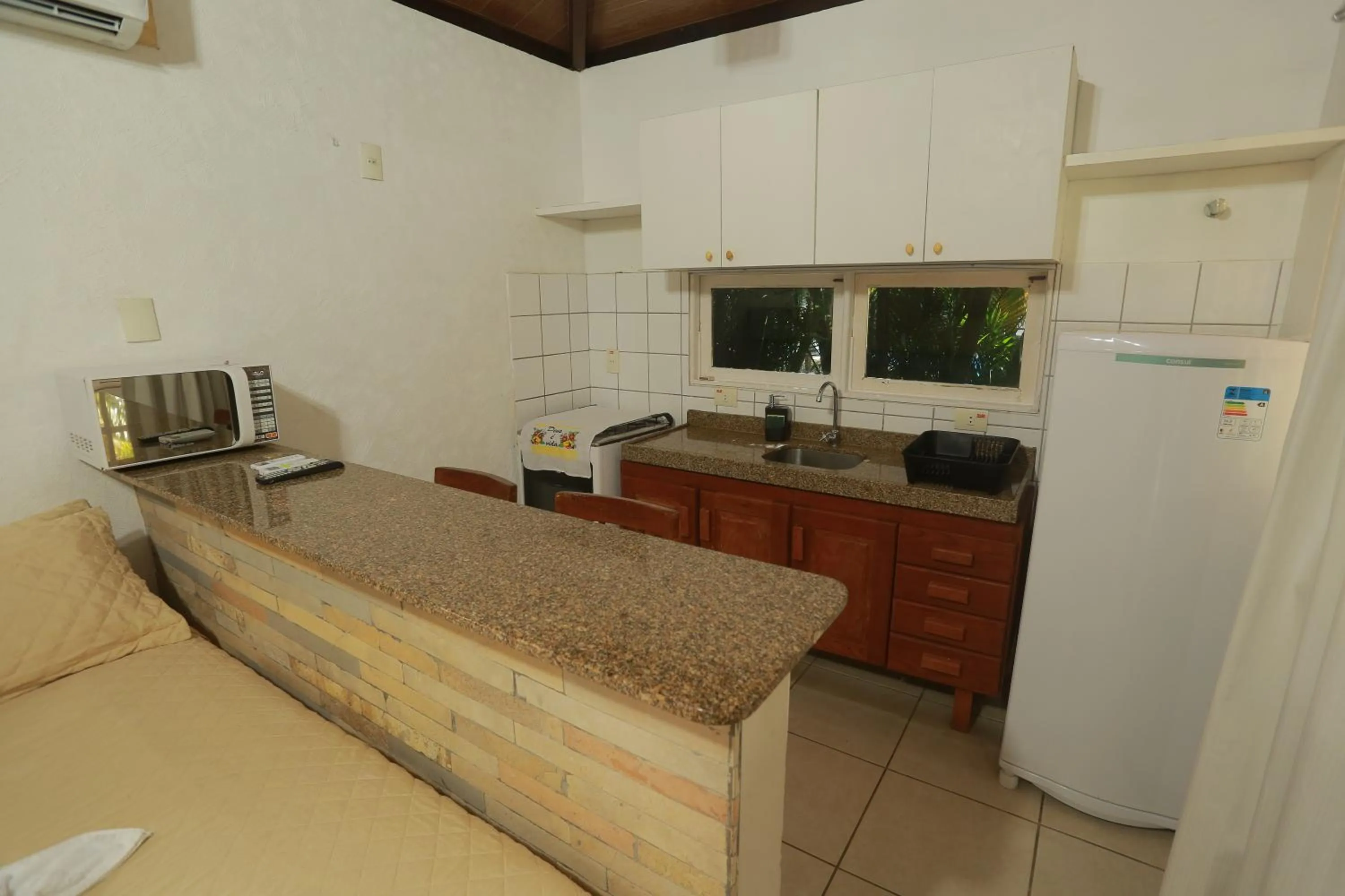 Kitchen or kitchenette in La Dolce Vita Flat & Pousada