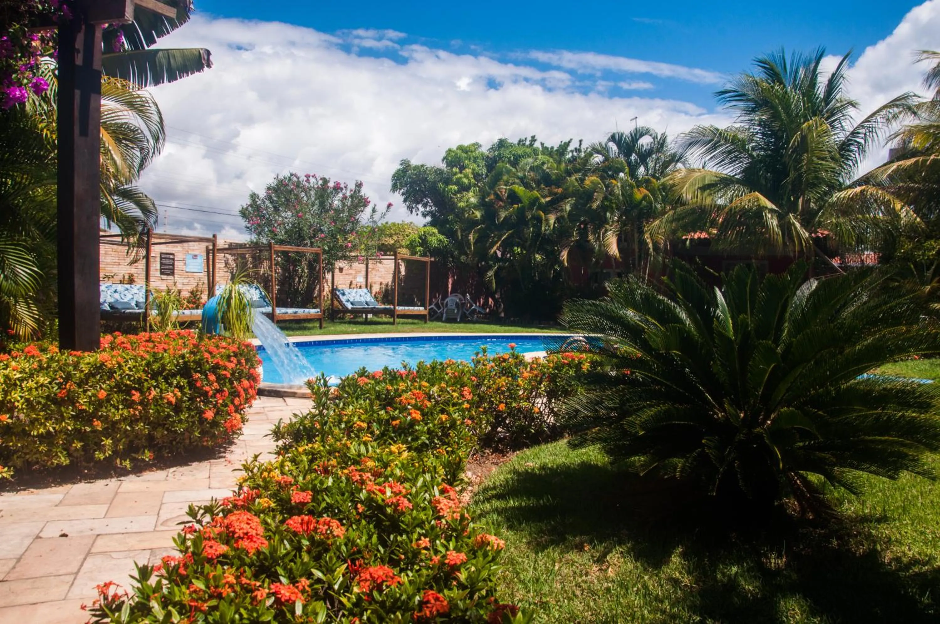 Swimming pool in La Dolce Vita Flat & Pousada