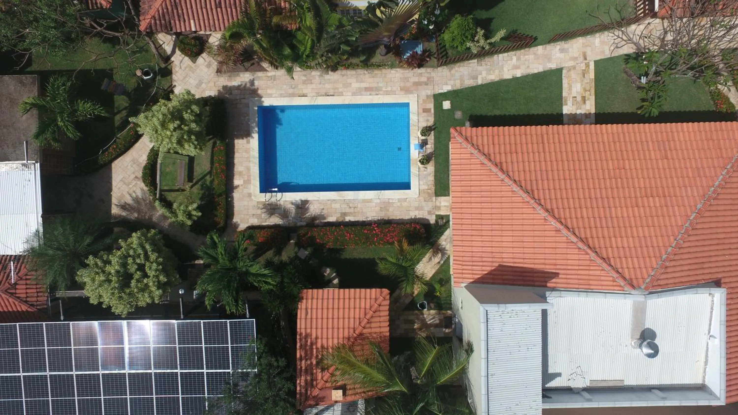 Swimming pool in La Dolce Vita Flat & Pousada