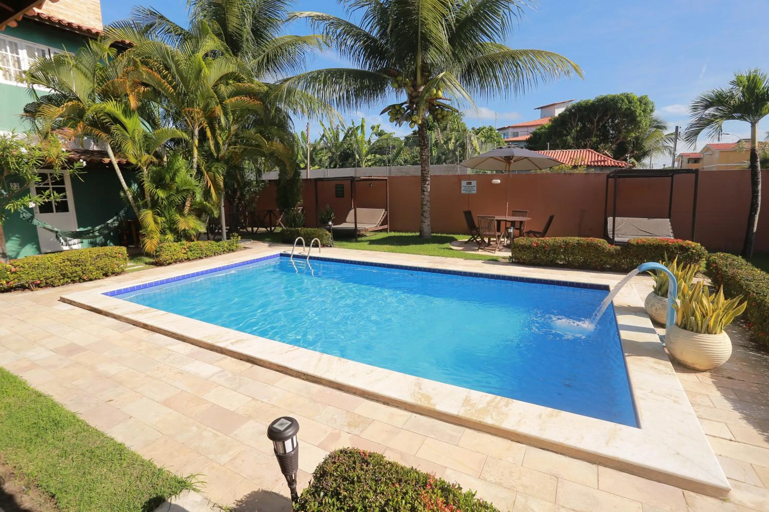 Swimming pool in La Dolce Vita Flat & Pousada