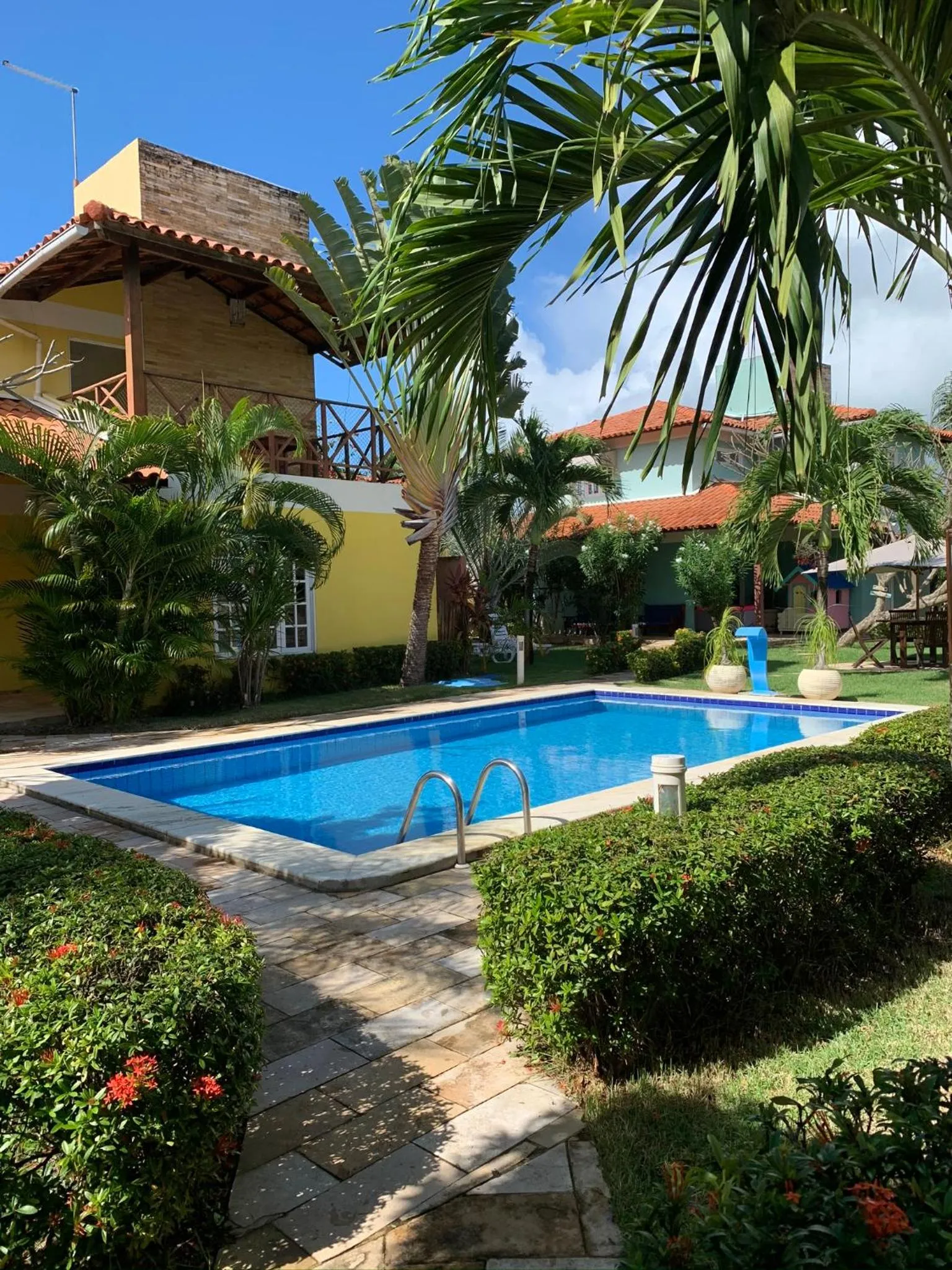 Swimming pool in La Dolce Vita Flat & Pousada