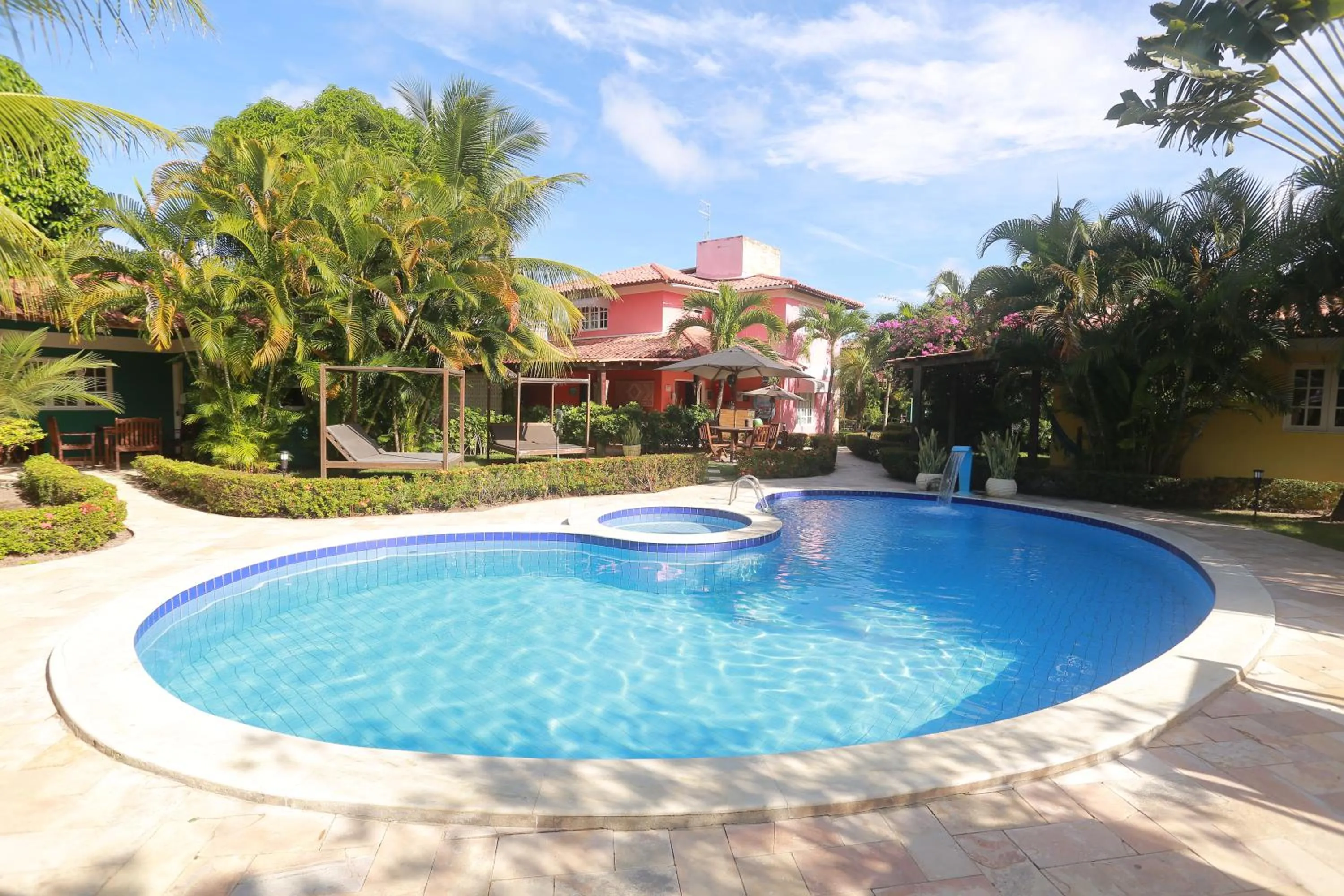 Swimming pool in La Dolce Vita Flat & Pousada