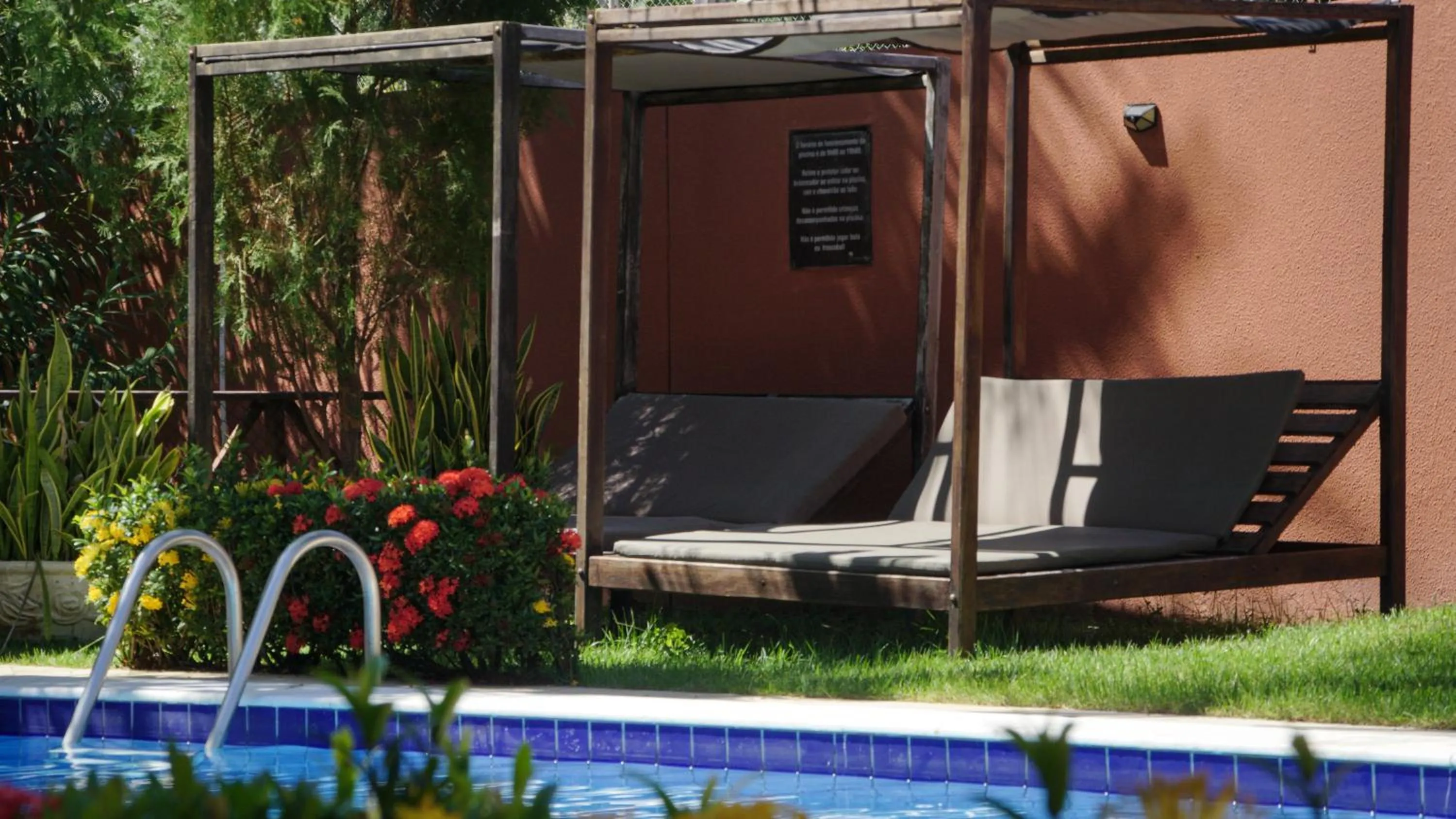 Swimming pool in La Dolce Vita Flat & Pousada