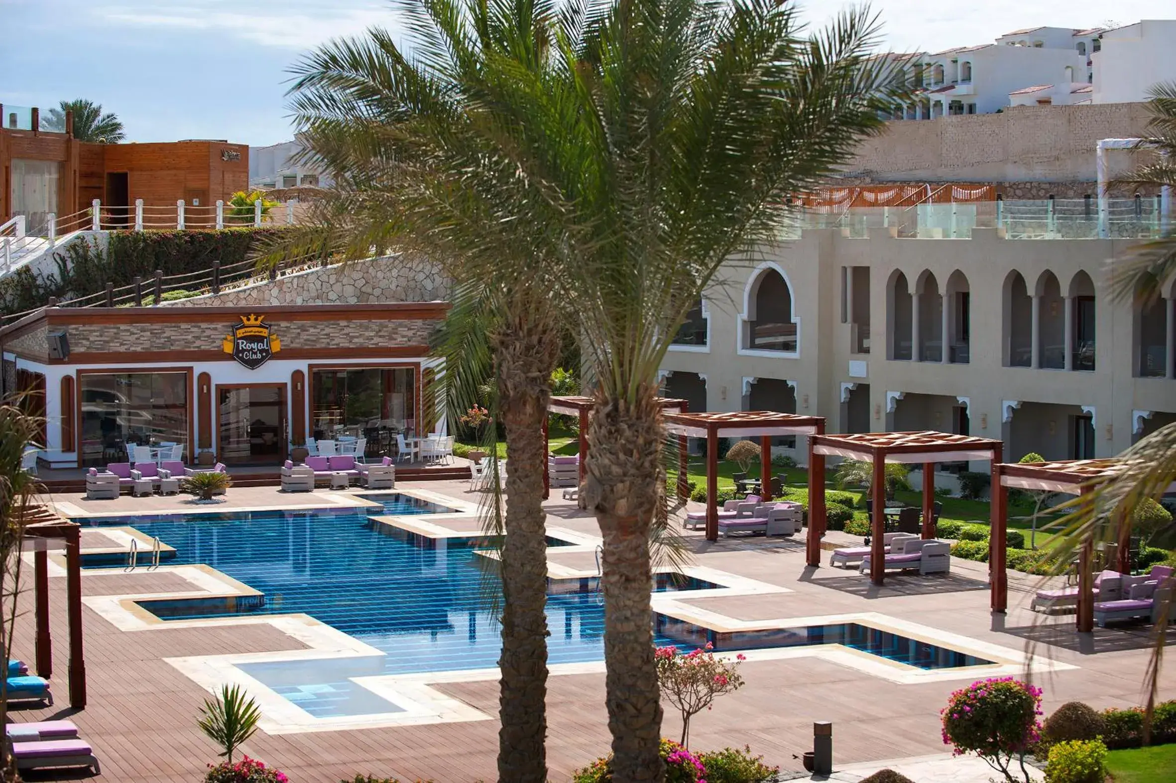 Swimming pool, Property Building in Sunrise Arabian Beach Resort