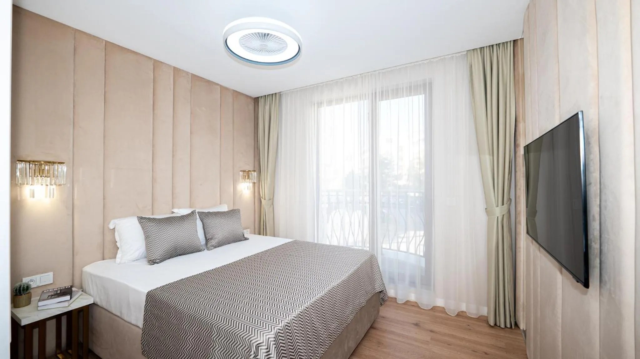 Bed in Harmony Suites Grand Resort