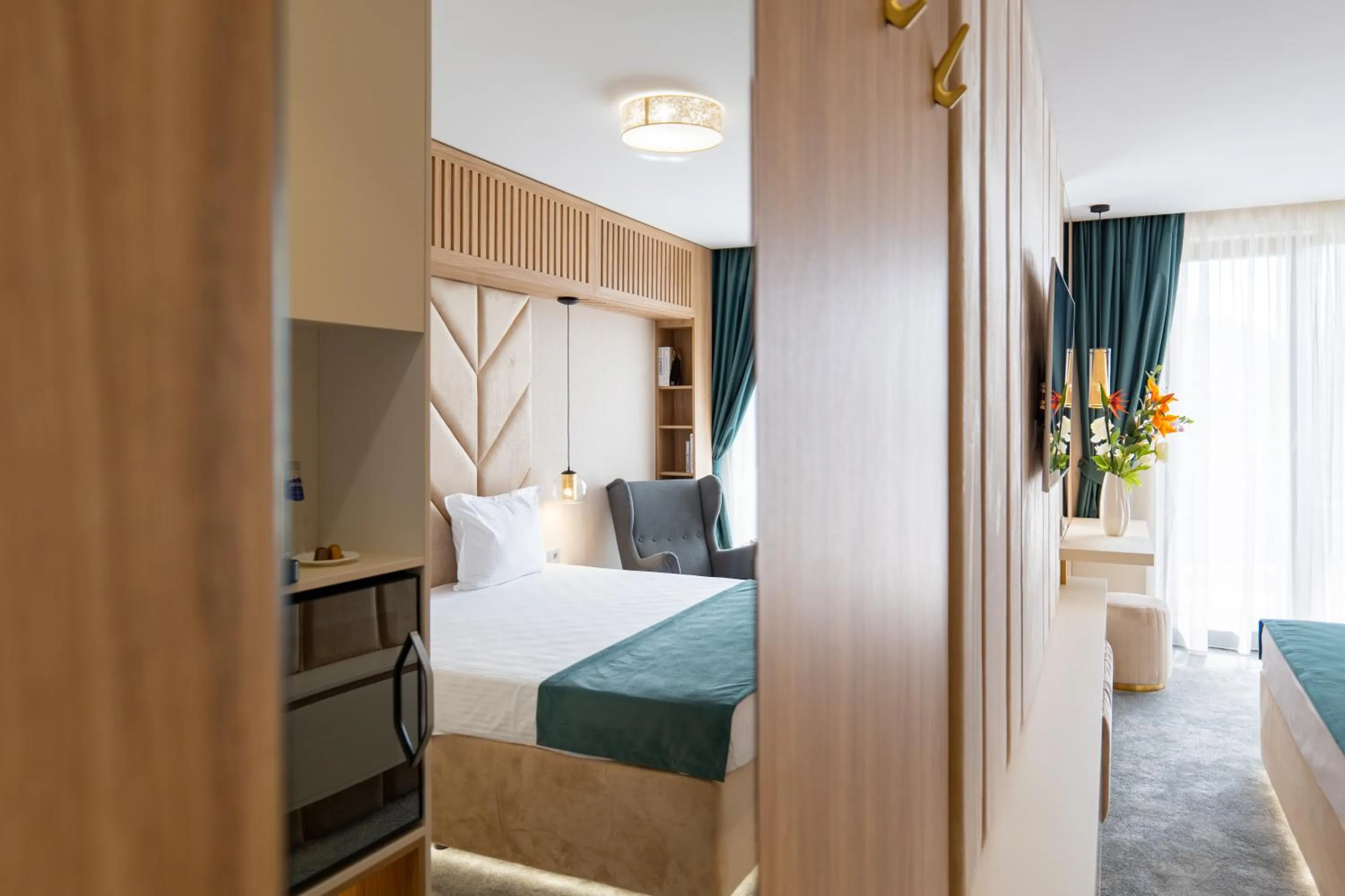 Bed in Harmony Suites Grand Resort