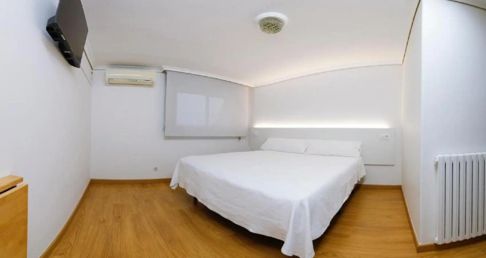 Bed in Pensión Venus