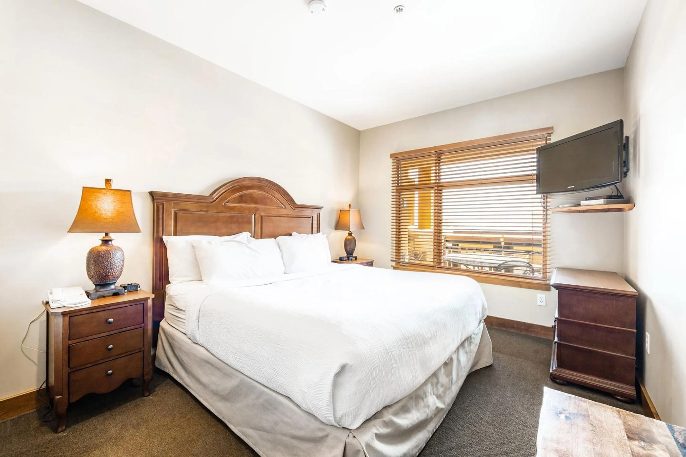 Bed in Sundial Lodge by All Seasons Resort Lodging