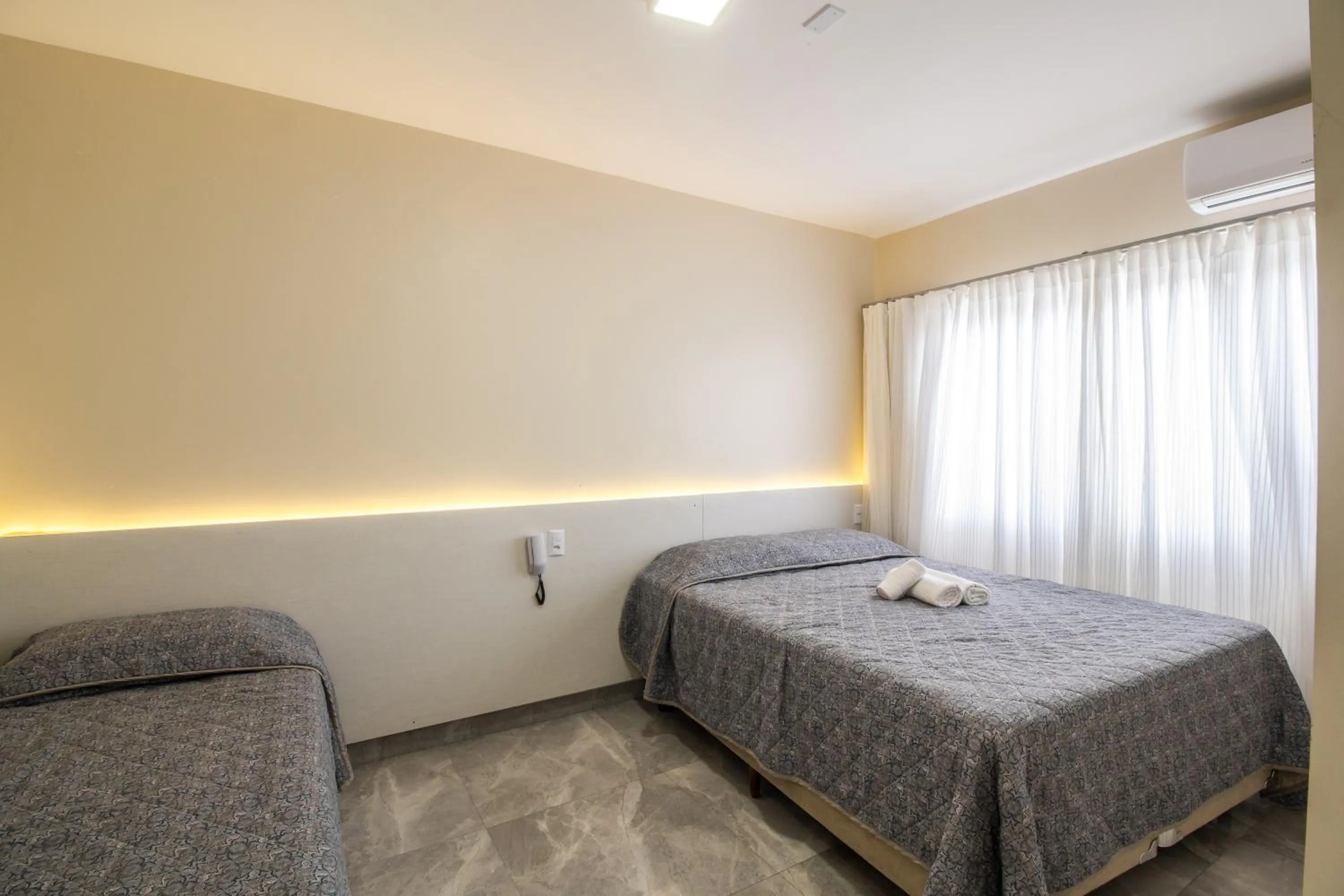 Bed in Pousada Espindola