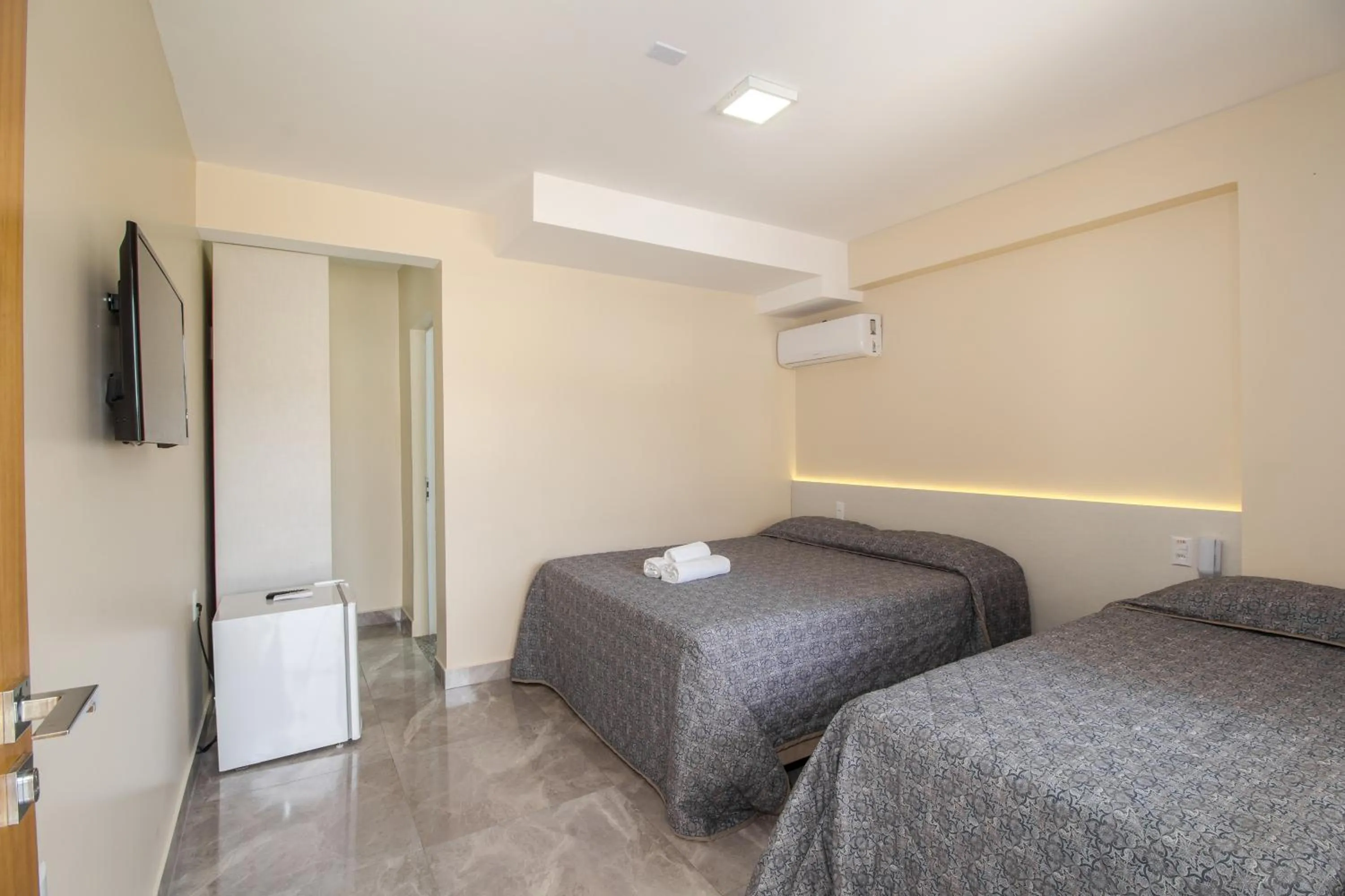 Bed in Pousada Espindola