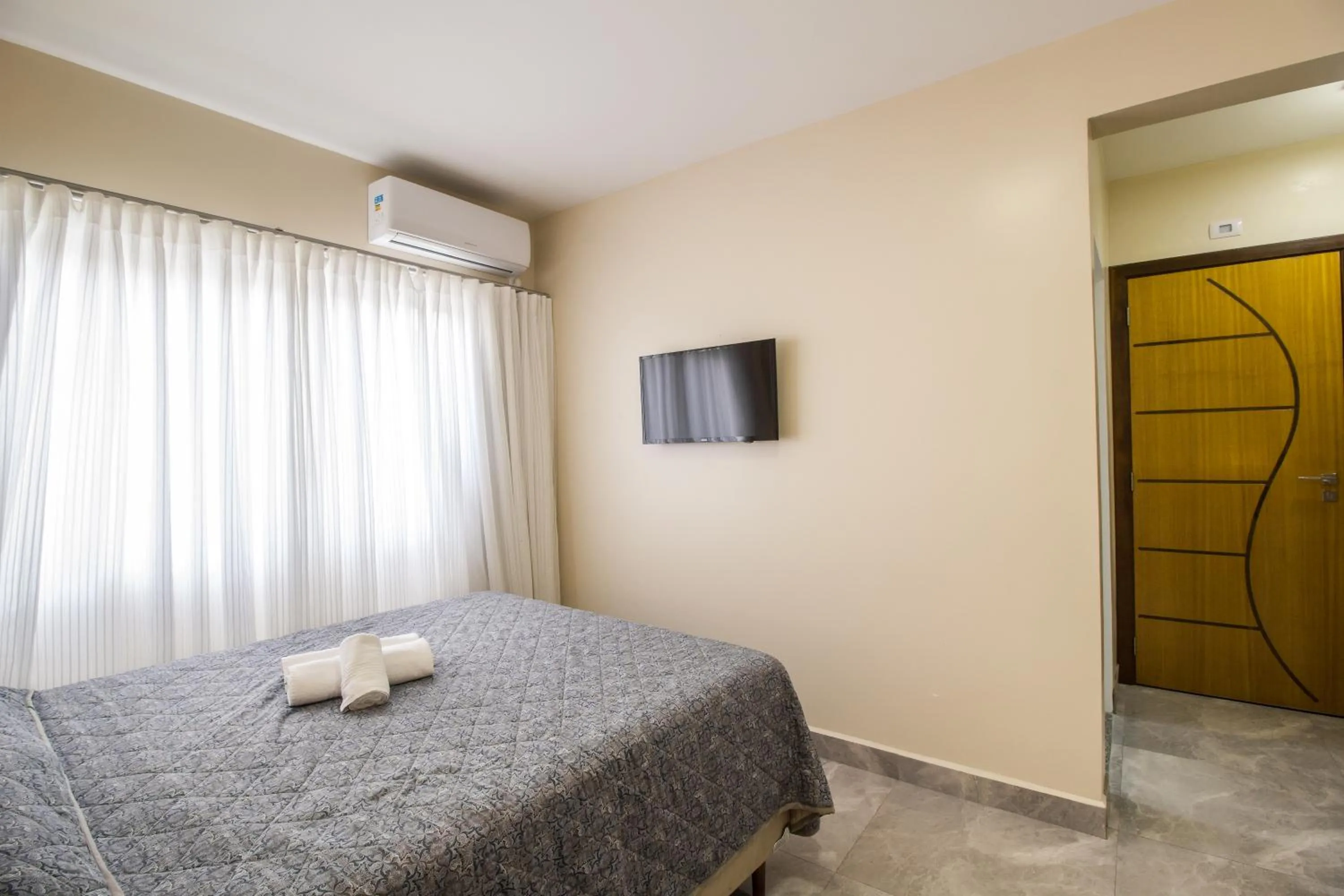 Bed in Pousada Espindola