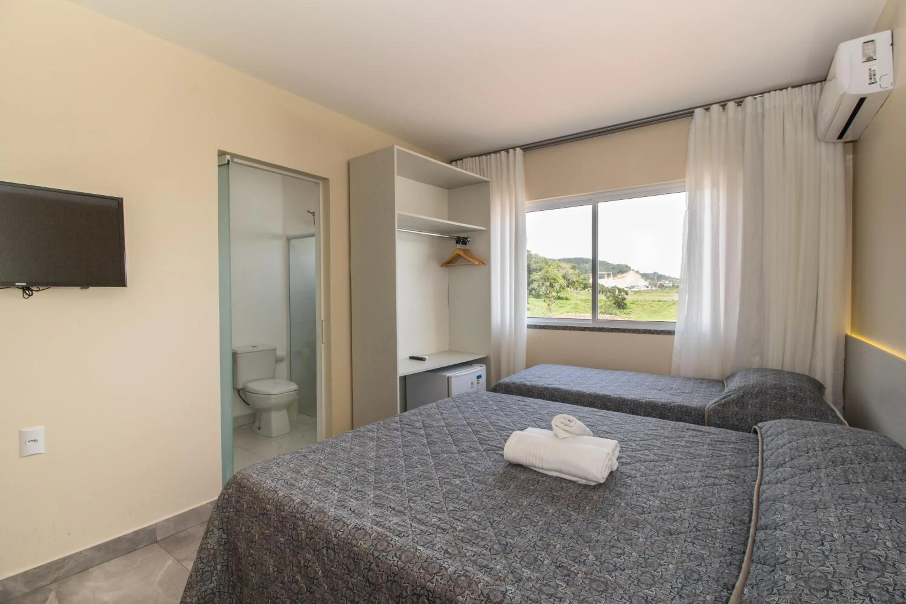 Bed in Pousada Espindola