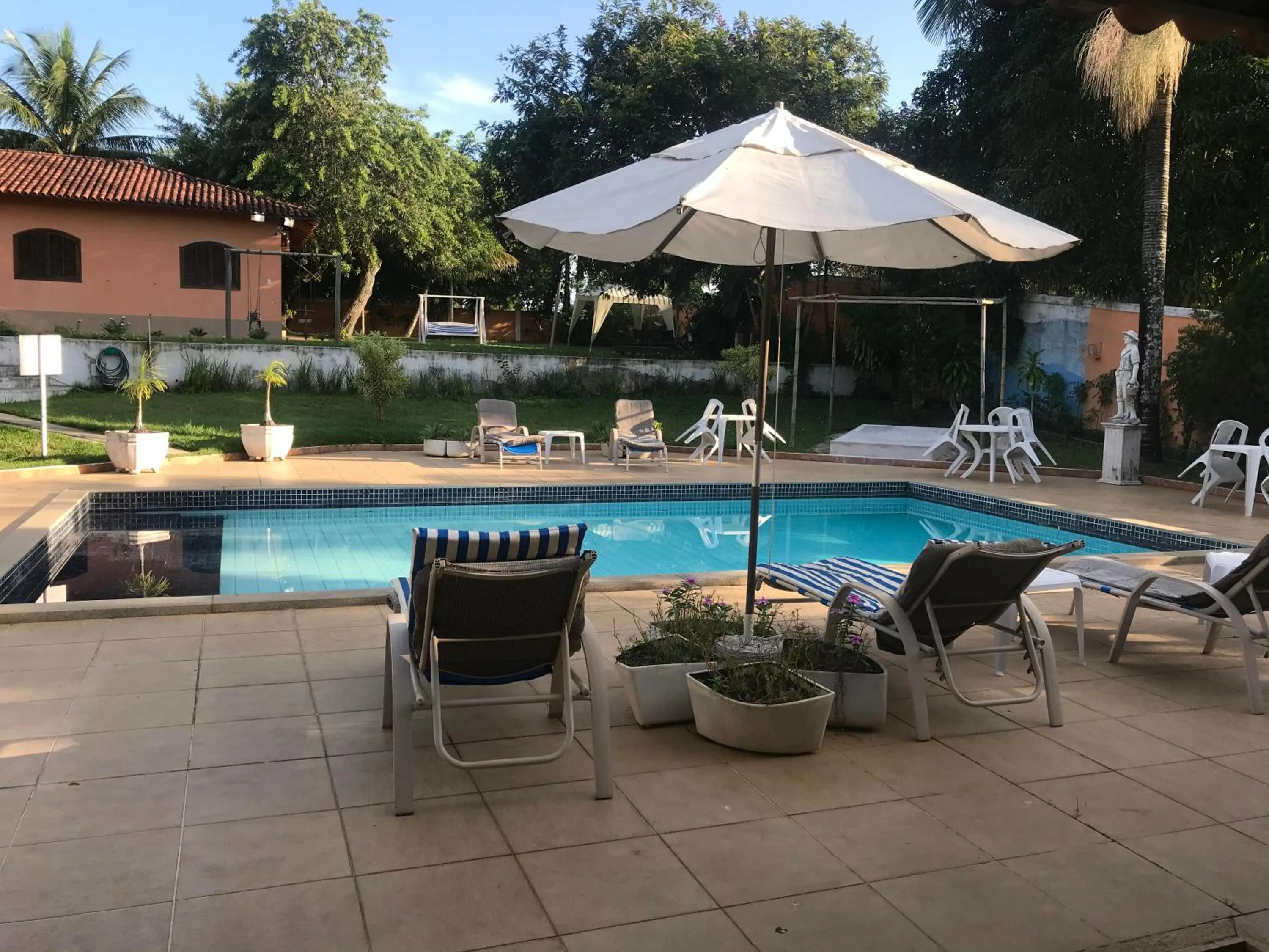 Swimming pool in Pousada Doce Vida Guarapari