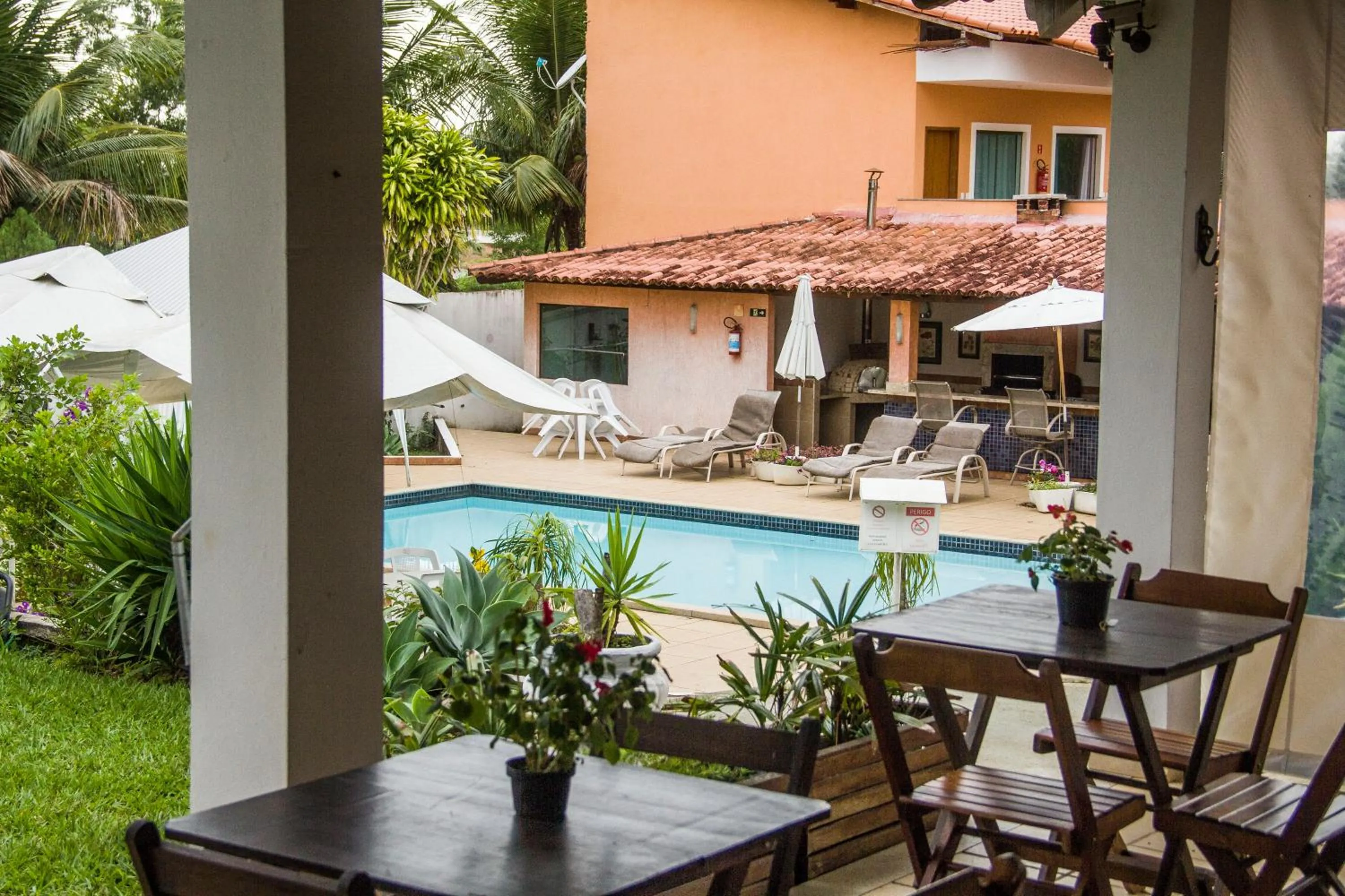 Swimming pool in Pousada Doce Vida Guarapari