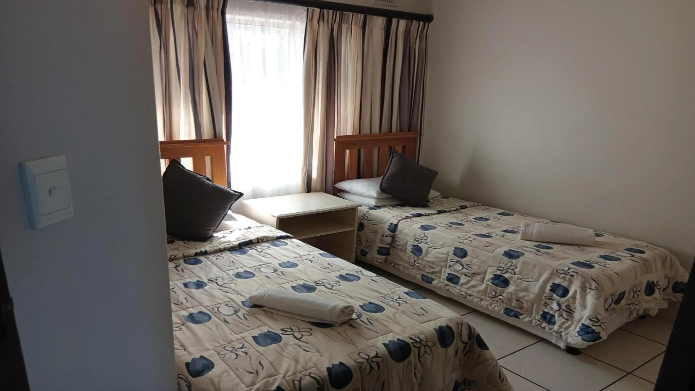 Photo of the whole room, Bed in Sunrise Beach Resort