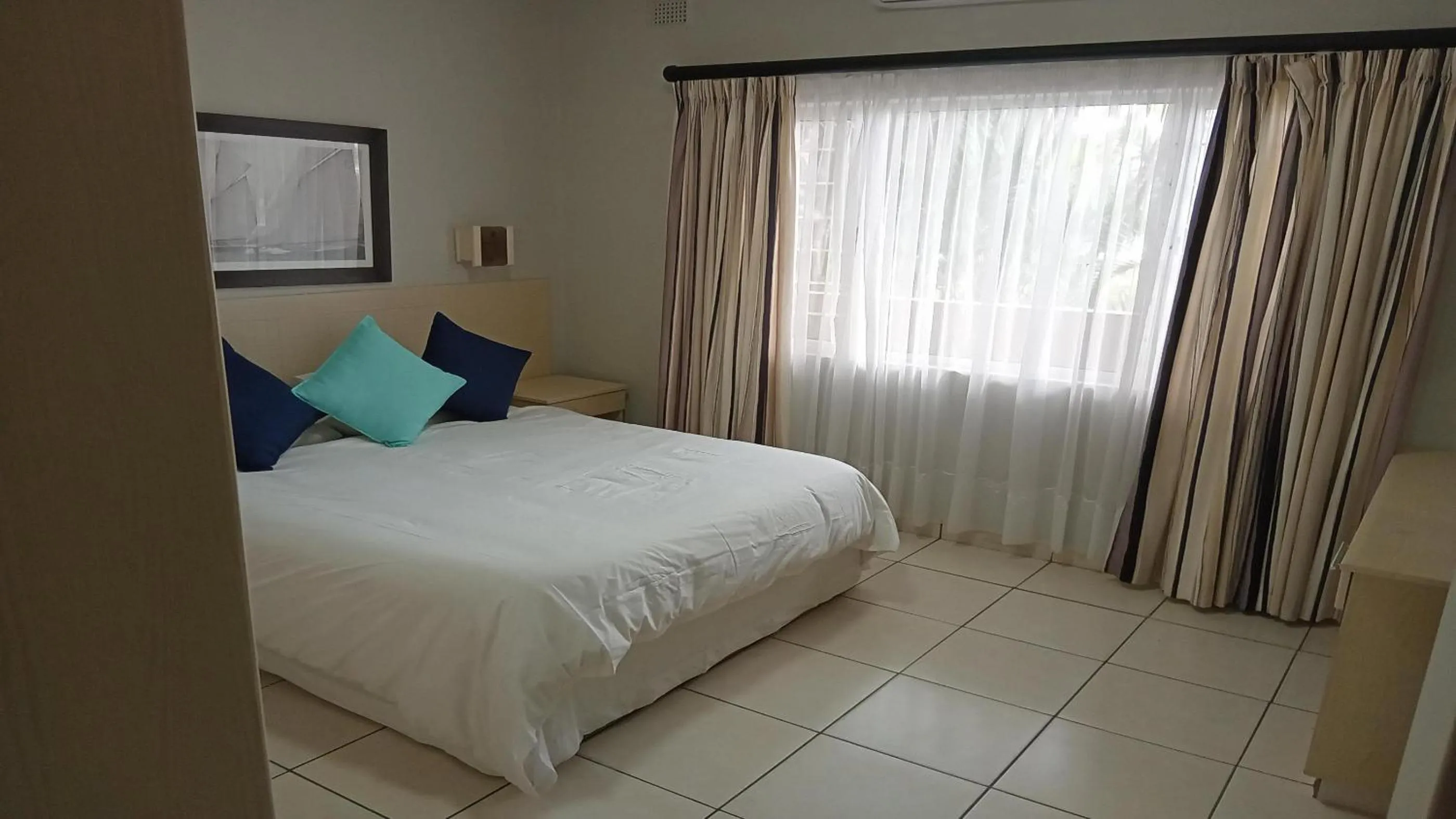 Bed in Sunrise Beach Resort