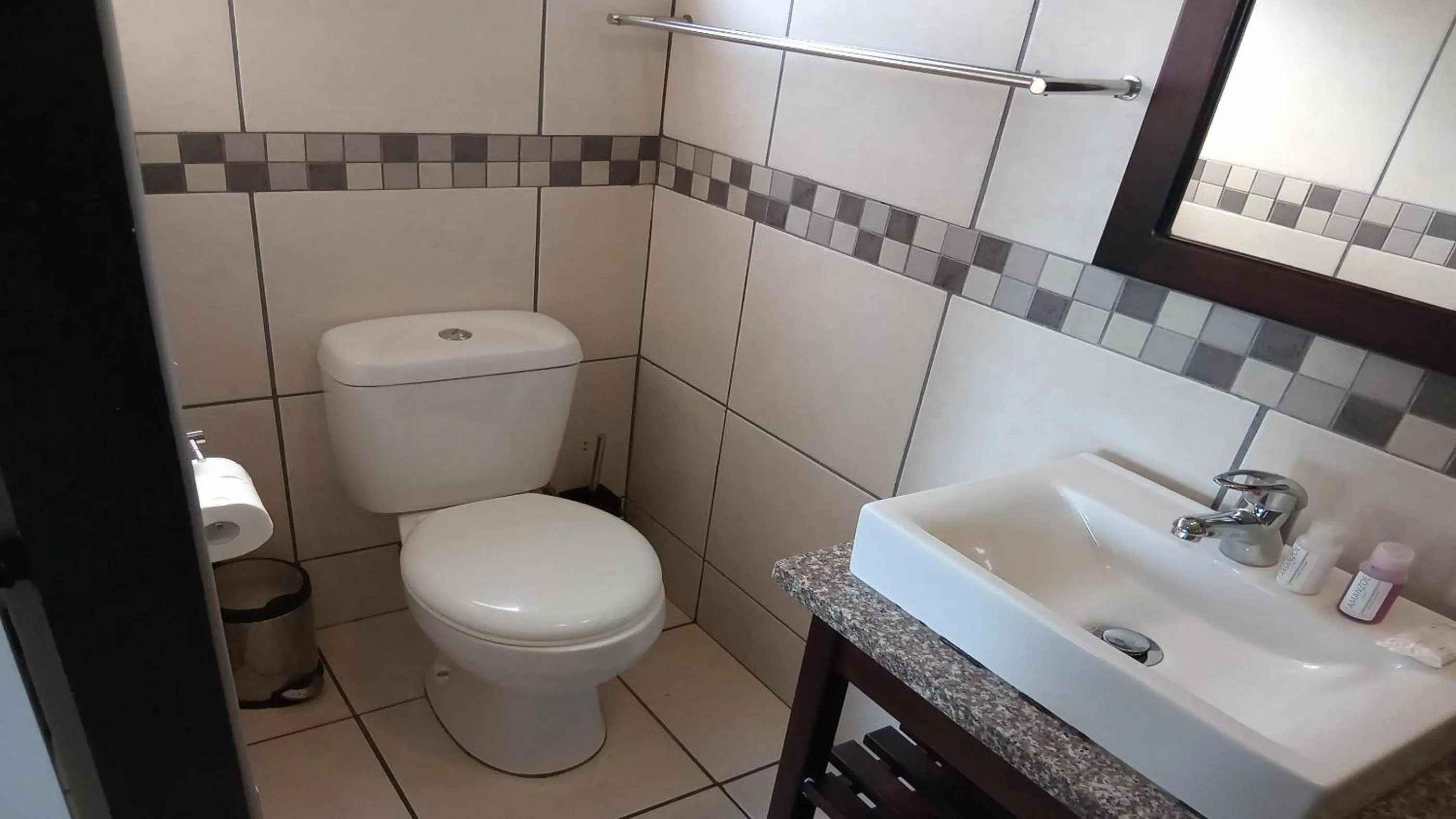 Toilet in Sunrise Beach Resort