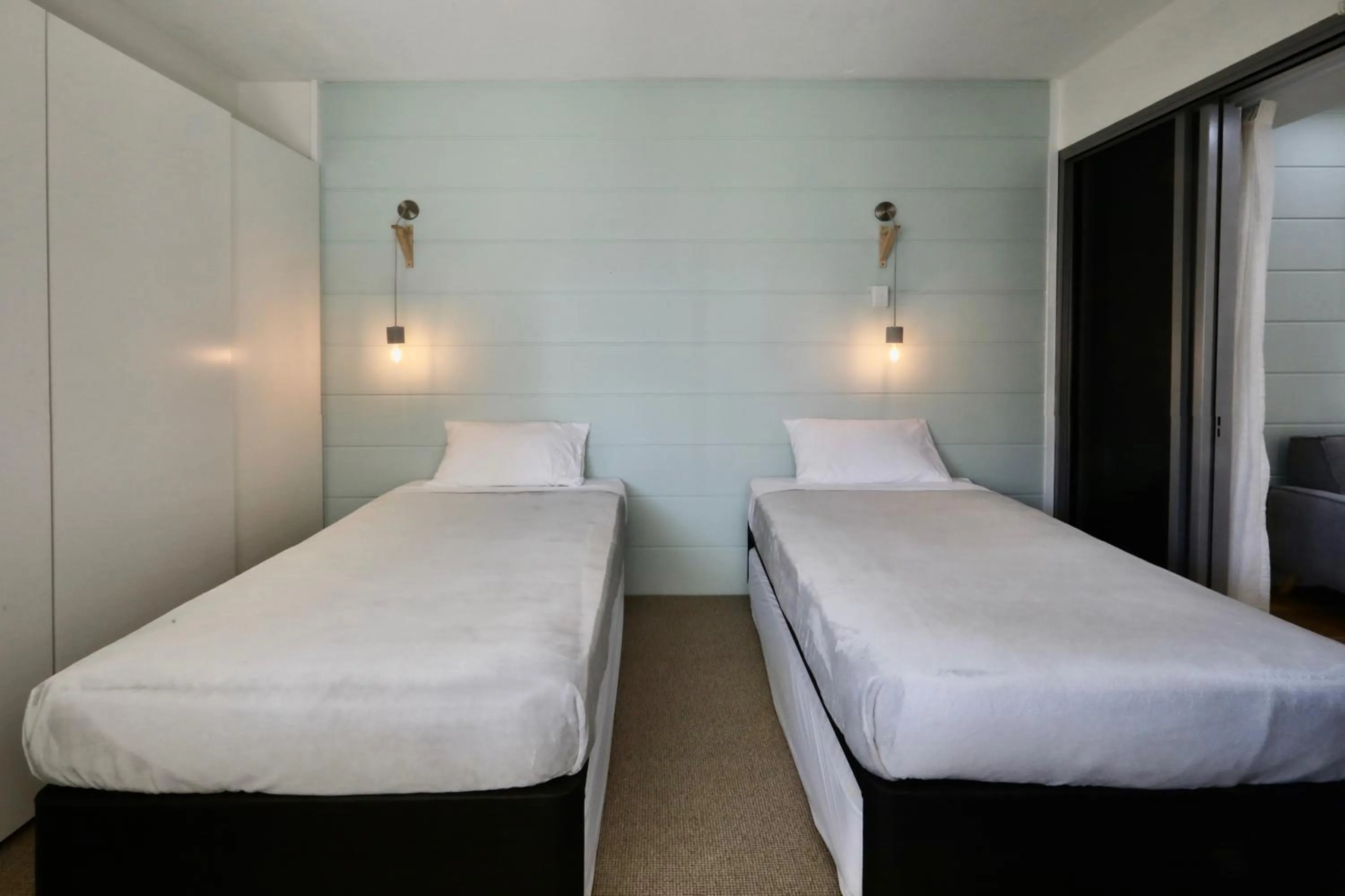 Bed in Space Holiday Apartments