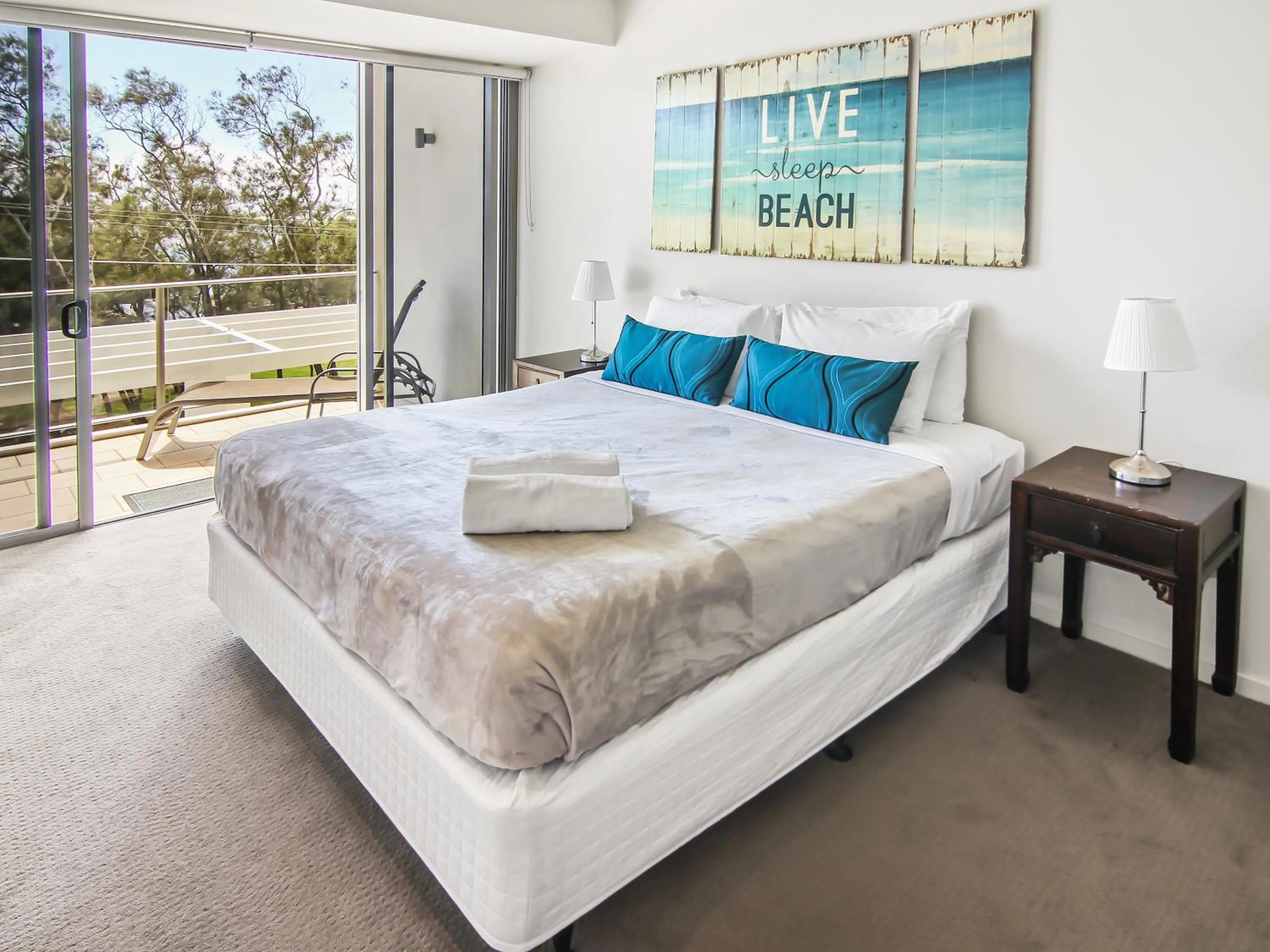 Bed in Space Holiday Apartments