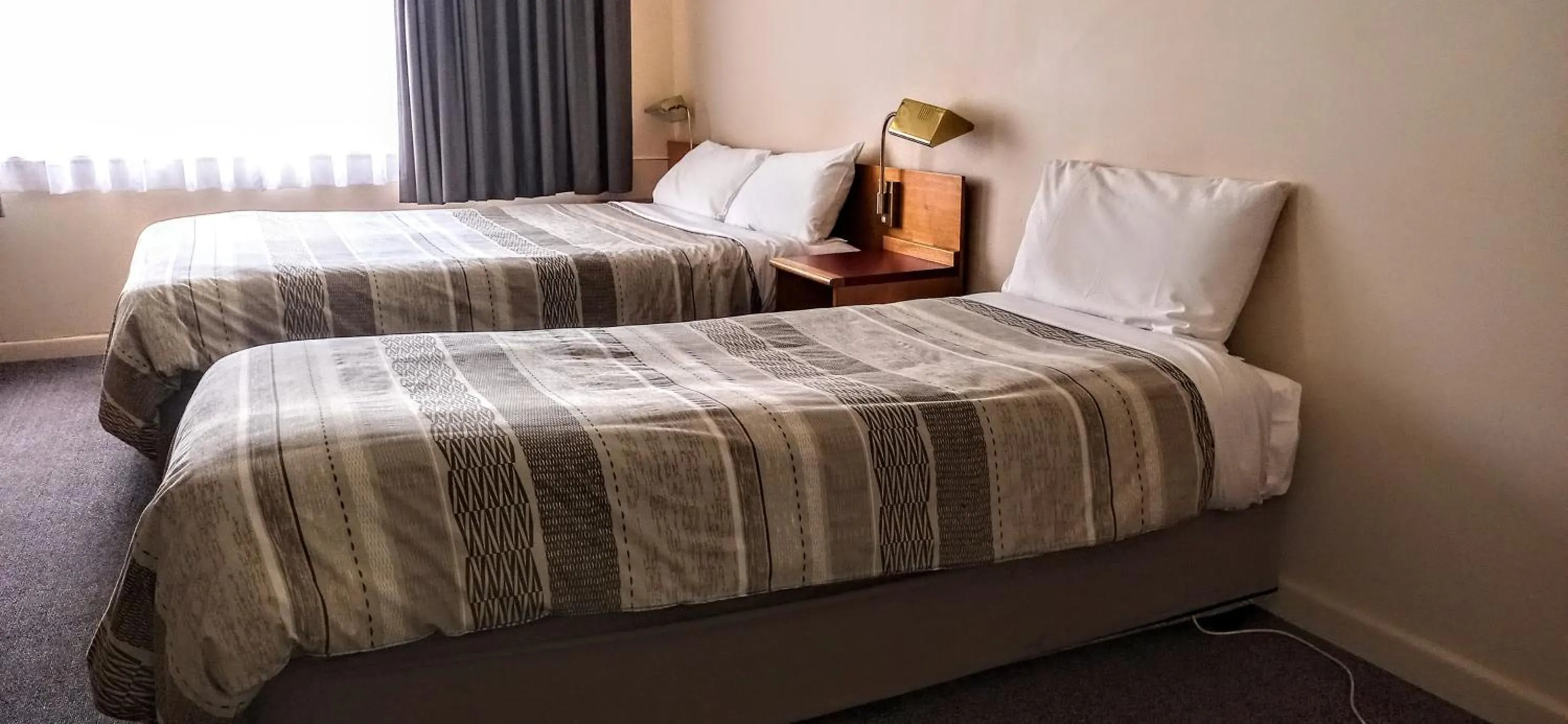 Photo of the whole room, Bed in Redhill Cooma Motor Inn